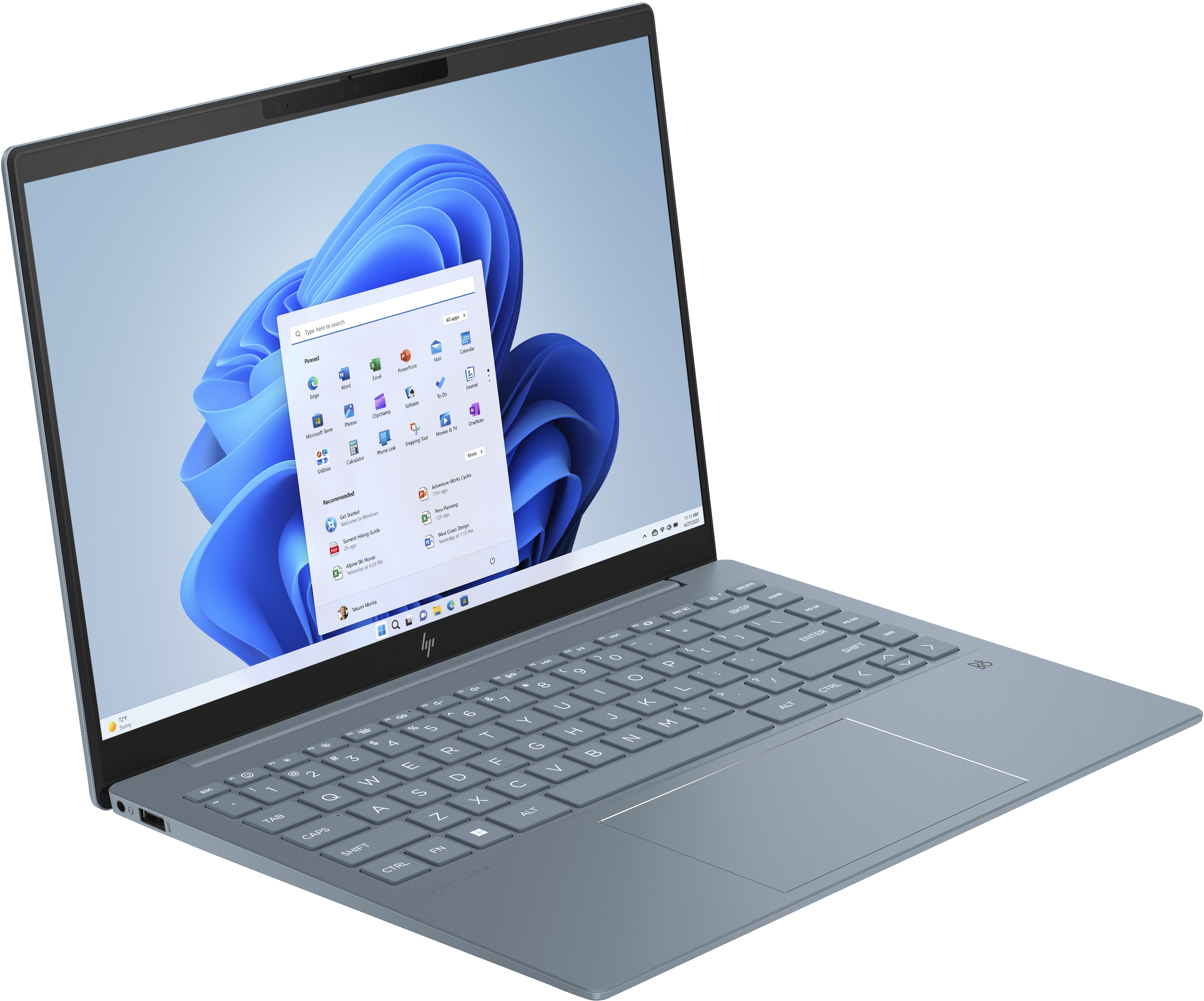 Szary laptop HP, widok z boku. Interfejs Windows 11, klawiatura widoczna.