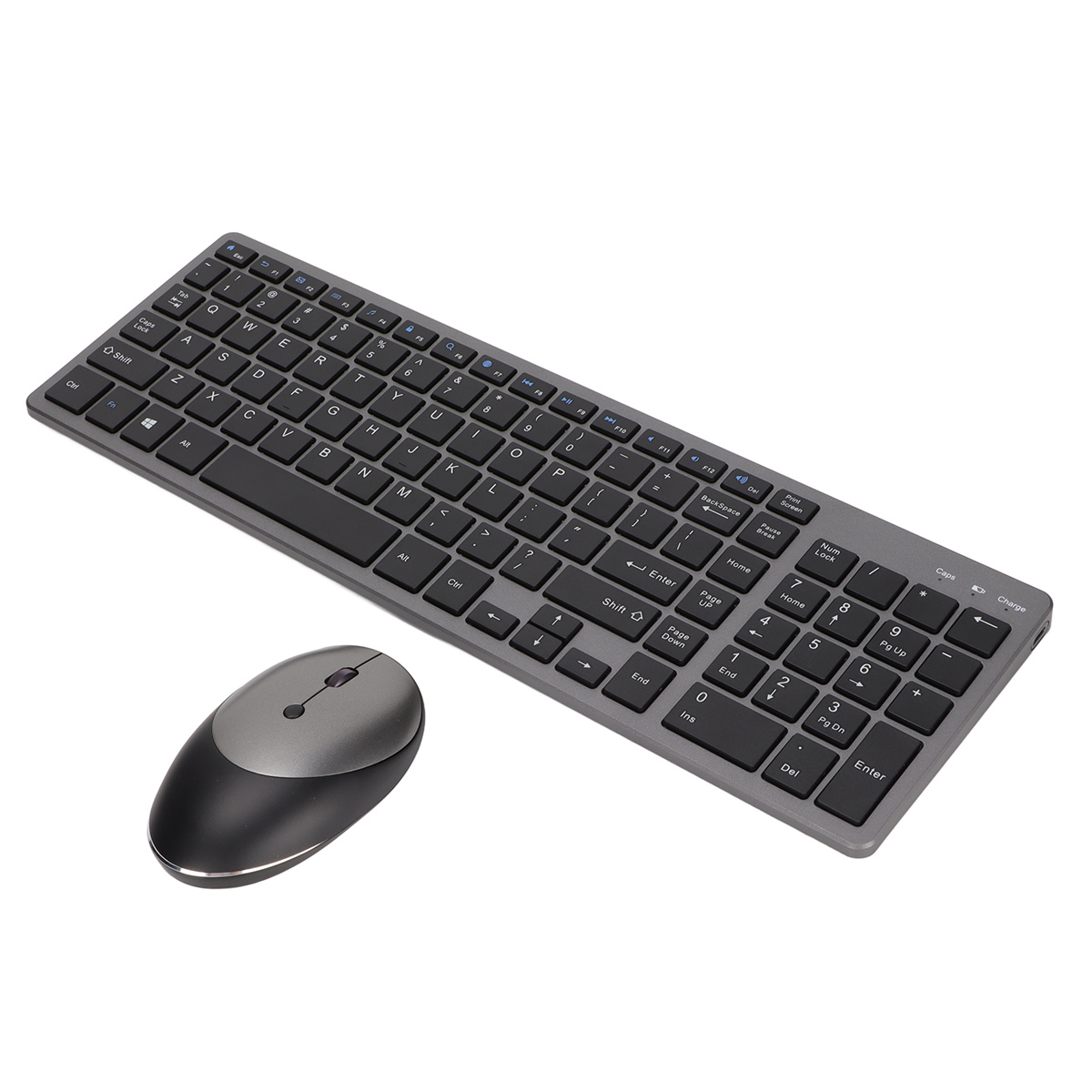 Graue Tastatur und Maus auf weißer Oberfläche; Tastatur hat einen Nummernblock.