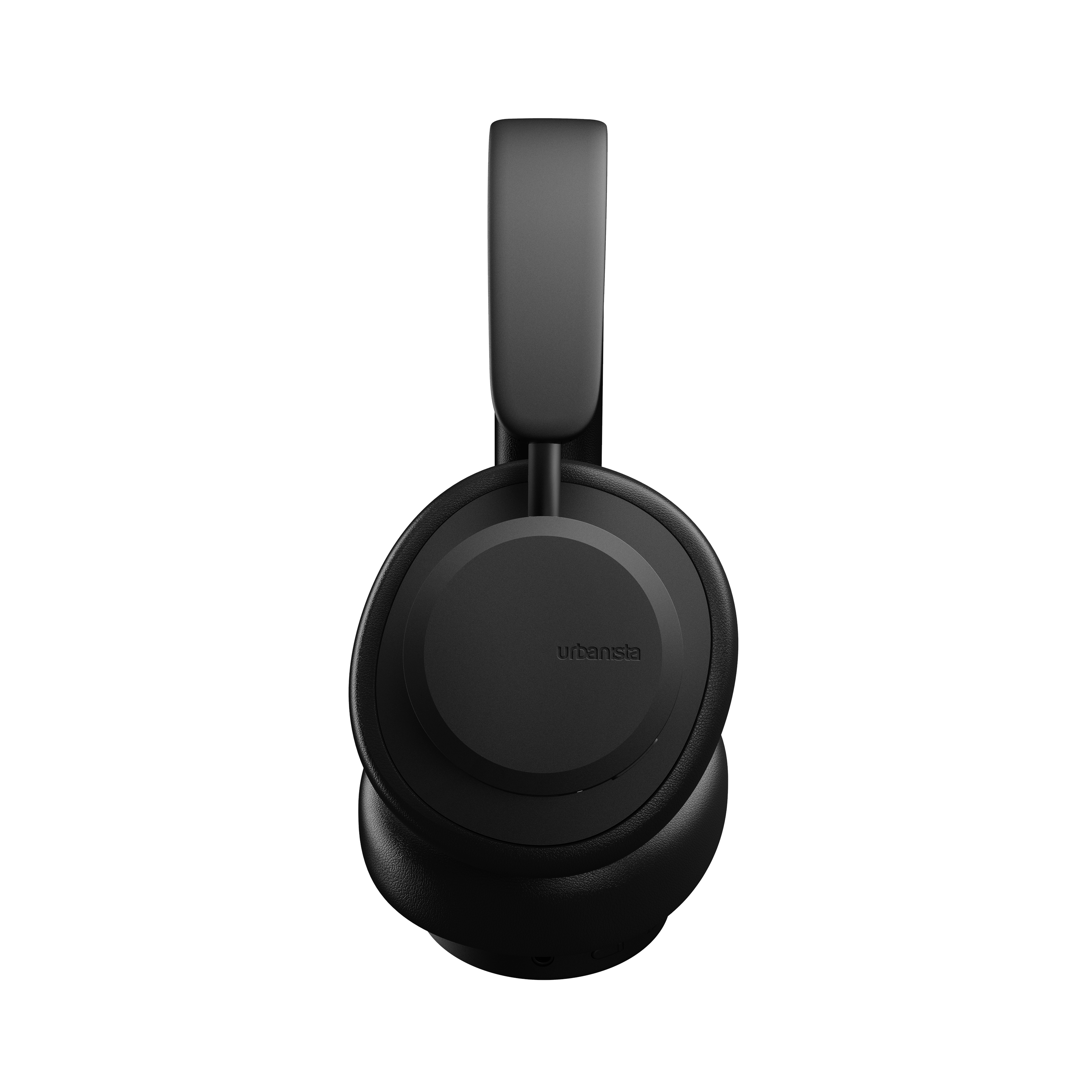 Czarne słuchawki nauszne. Słuchawki są na czarnym tle.