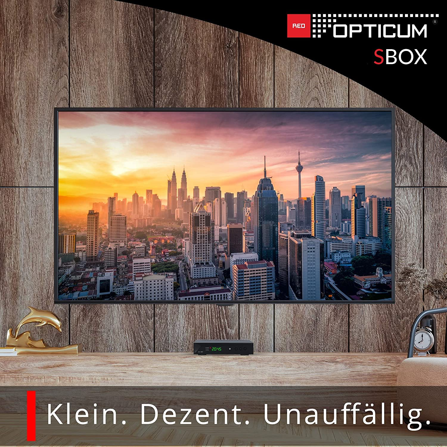 Ein Fernsehbildschirm mit einer Stadtlandschaft, darunter eine Set-Top-Box und Text.