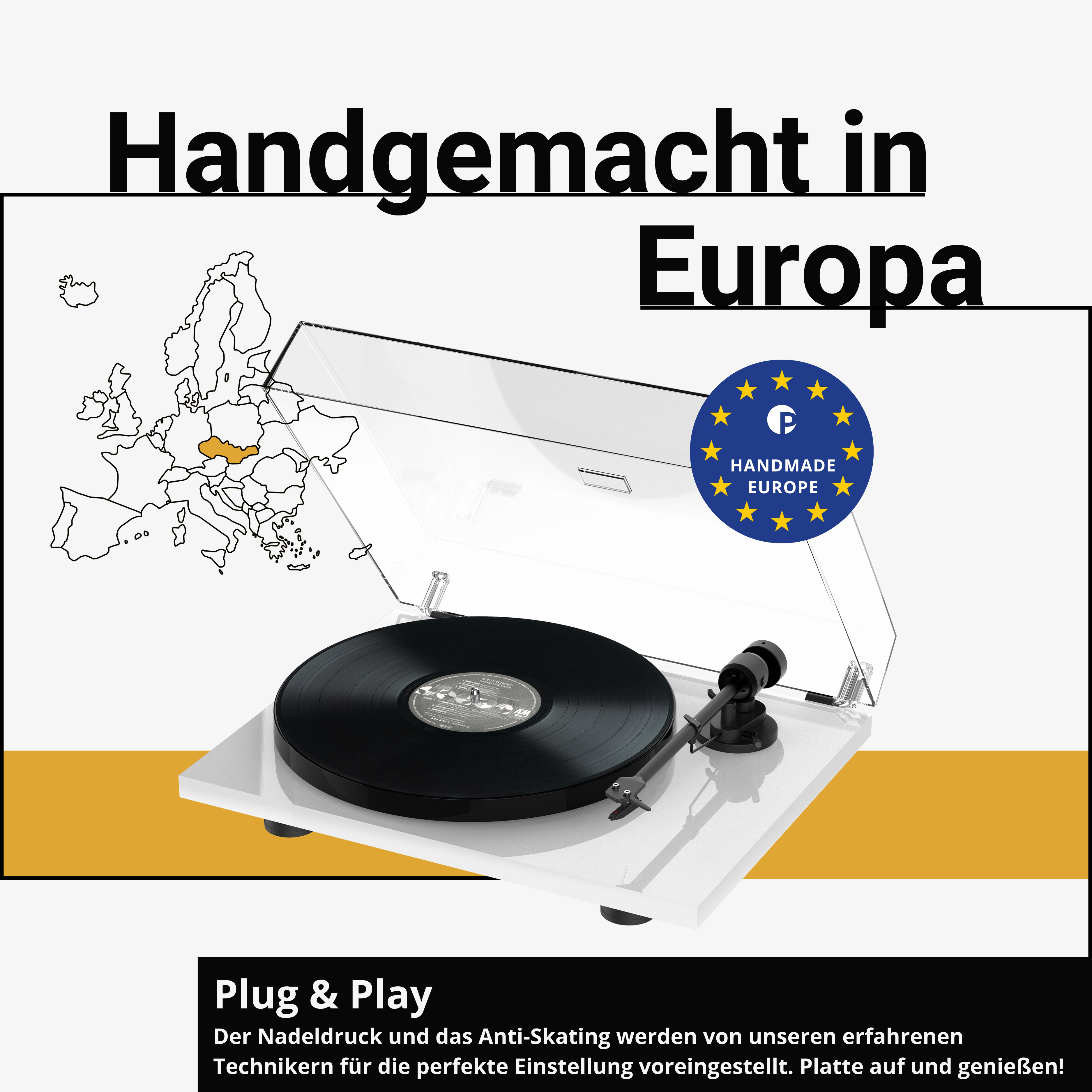 Witte platenspeler met zwarte plaat, doorzichtige kap en de tekst 'Handmade in Europe'.