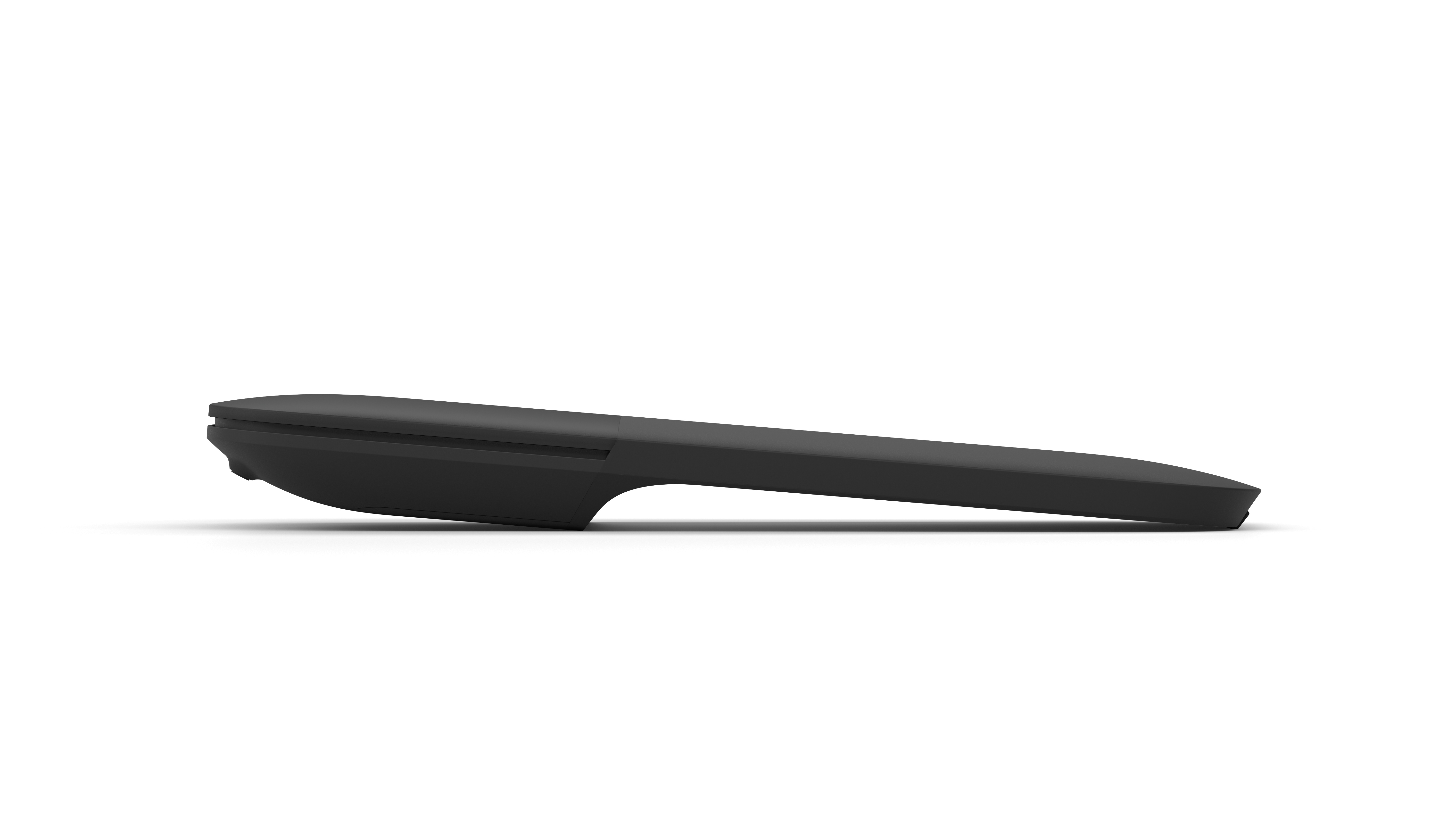 Czarny pilot, widok z boku. Prosty design, z lekko zakrzywionym kształtem i przyciskami.