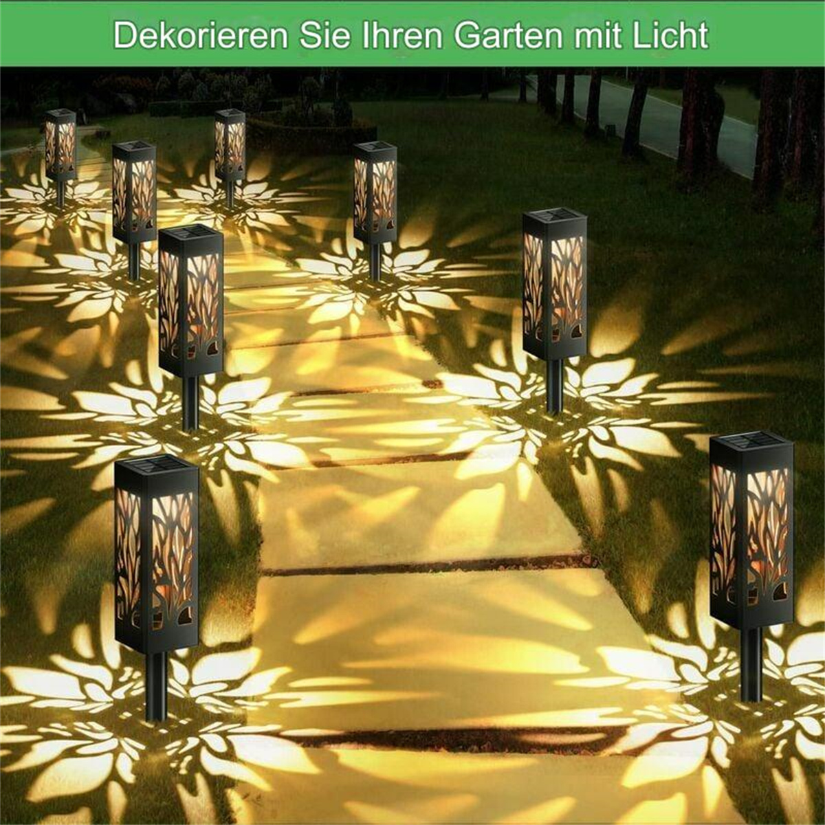 Gartenlichter. Schwarze Solarlampen auf einem Weg, die Schattenmuster auf den Boden werfen.
