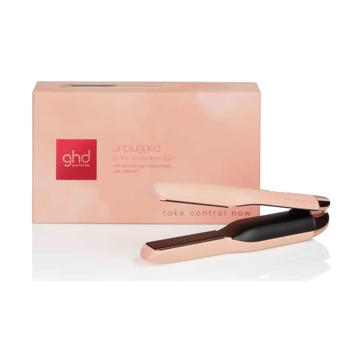 Una scatola rosa con una piastra per capelli e la scritta 'take control now' su sfondo bianco.