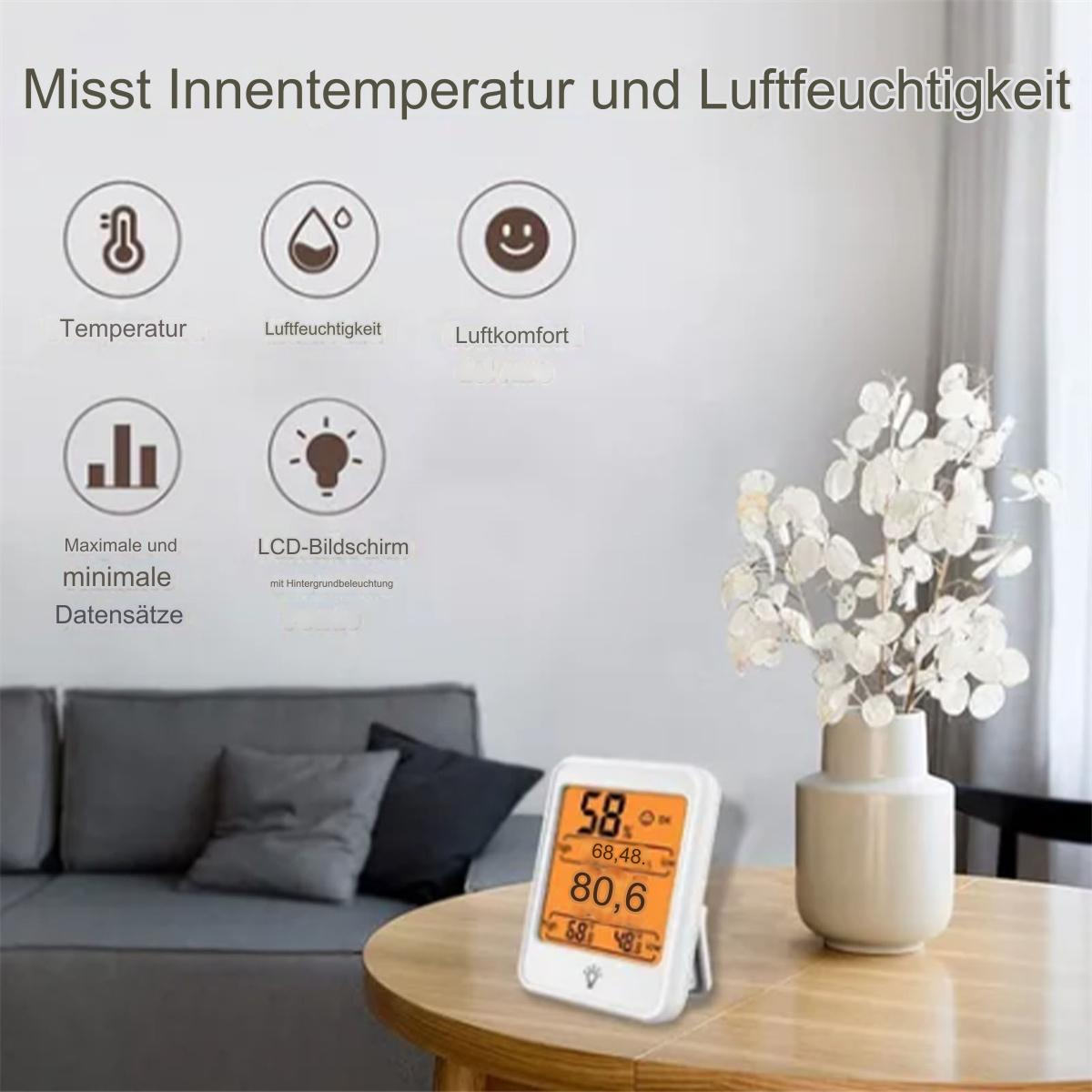 Weißes Display mit Zahlen. Symbole für Thermometer, Wassertropfen und Gesicht. Vase mit Blumen.