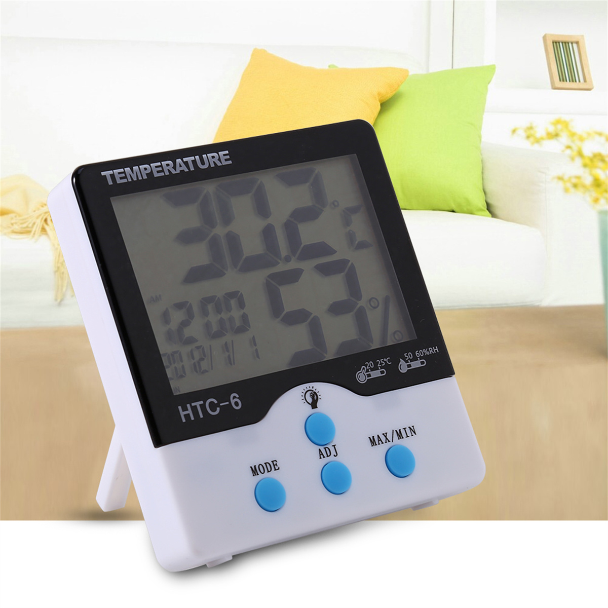 Digitales Thermometer. Zeigt Temperatur, Luftfeuchtigkeit und Uhrzeit an. Es hat drei Tasten für Modus, Einstellen und Max/Min.