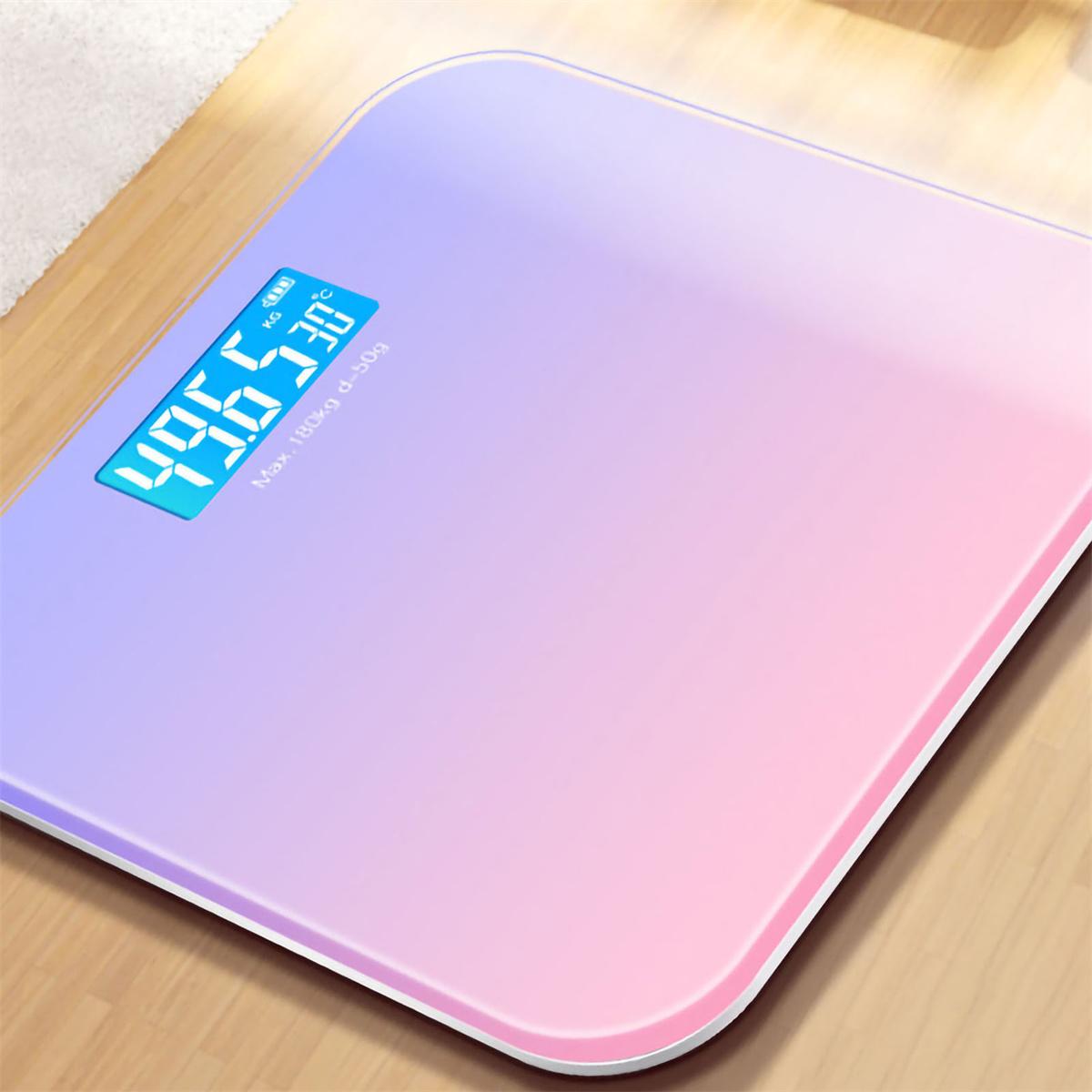 Eine Digitalwaage mit einer Oberfläche von Pink zu Lila, die das Gewicht anzeigt.