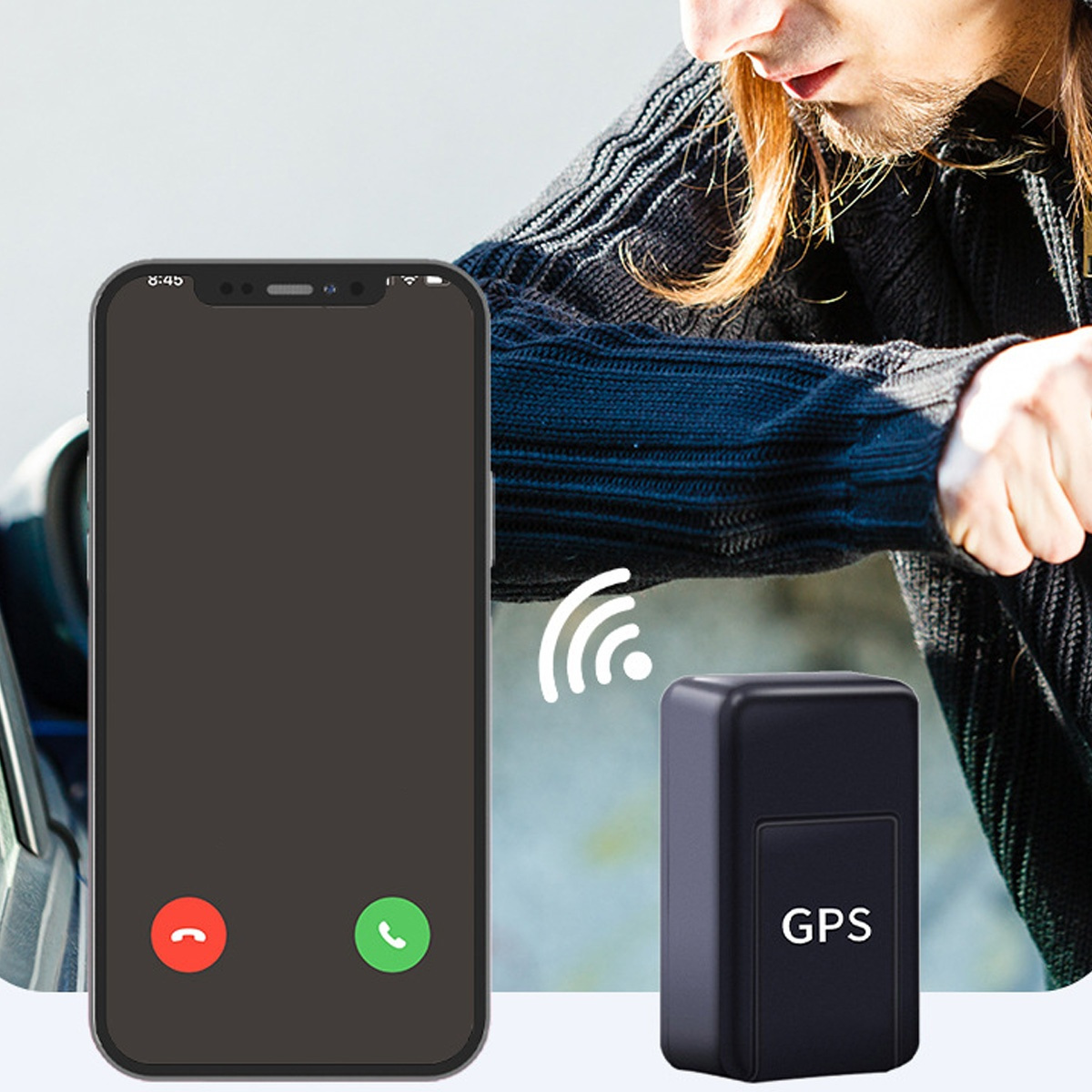 Ein Telefon, das einen Anrufbildschirm und einen kleinen schwarzen GPS-Tracker zeigt.