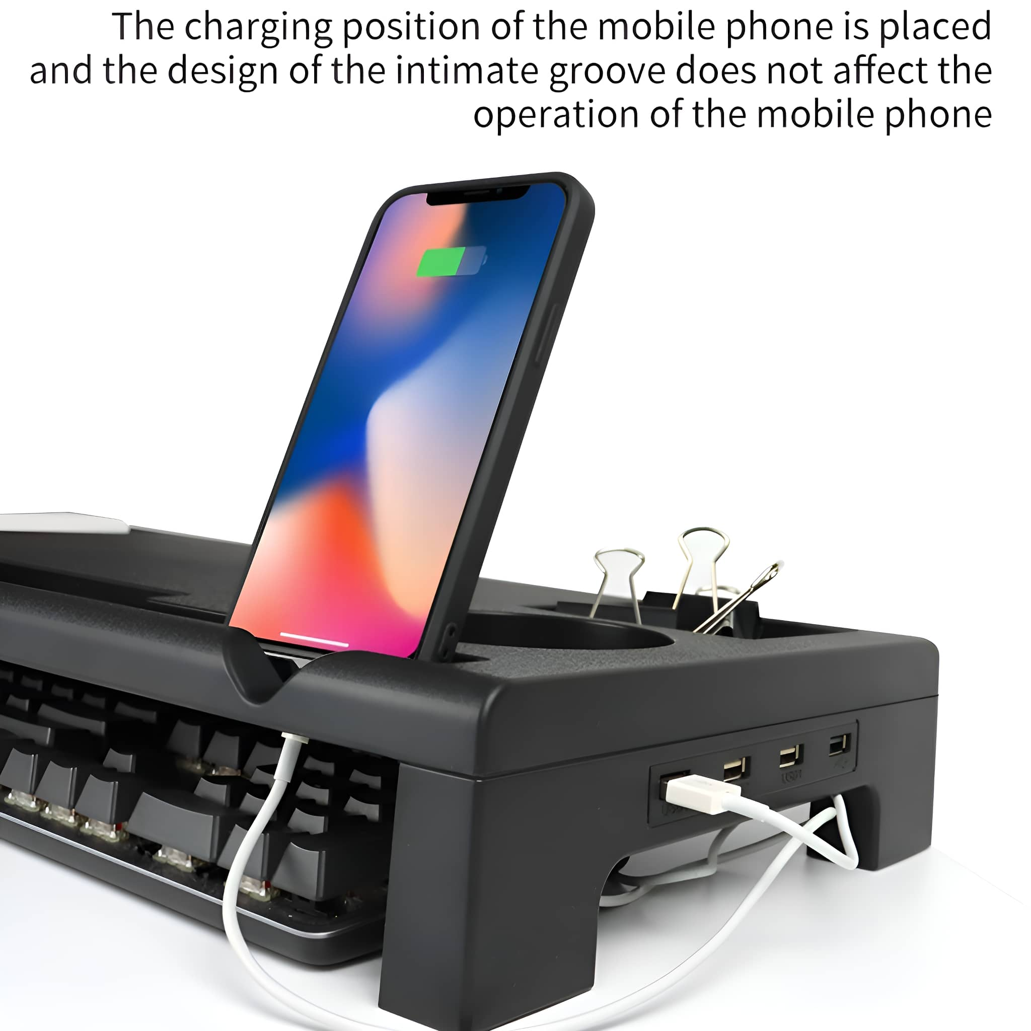 Schwarzer Schreibtisch-Organizer mit Telefonladung, Tastatur und zwei Clips.