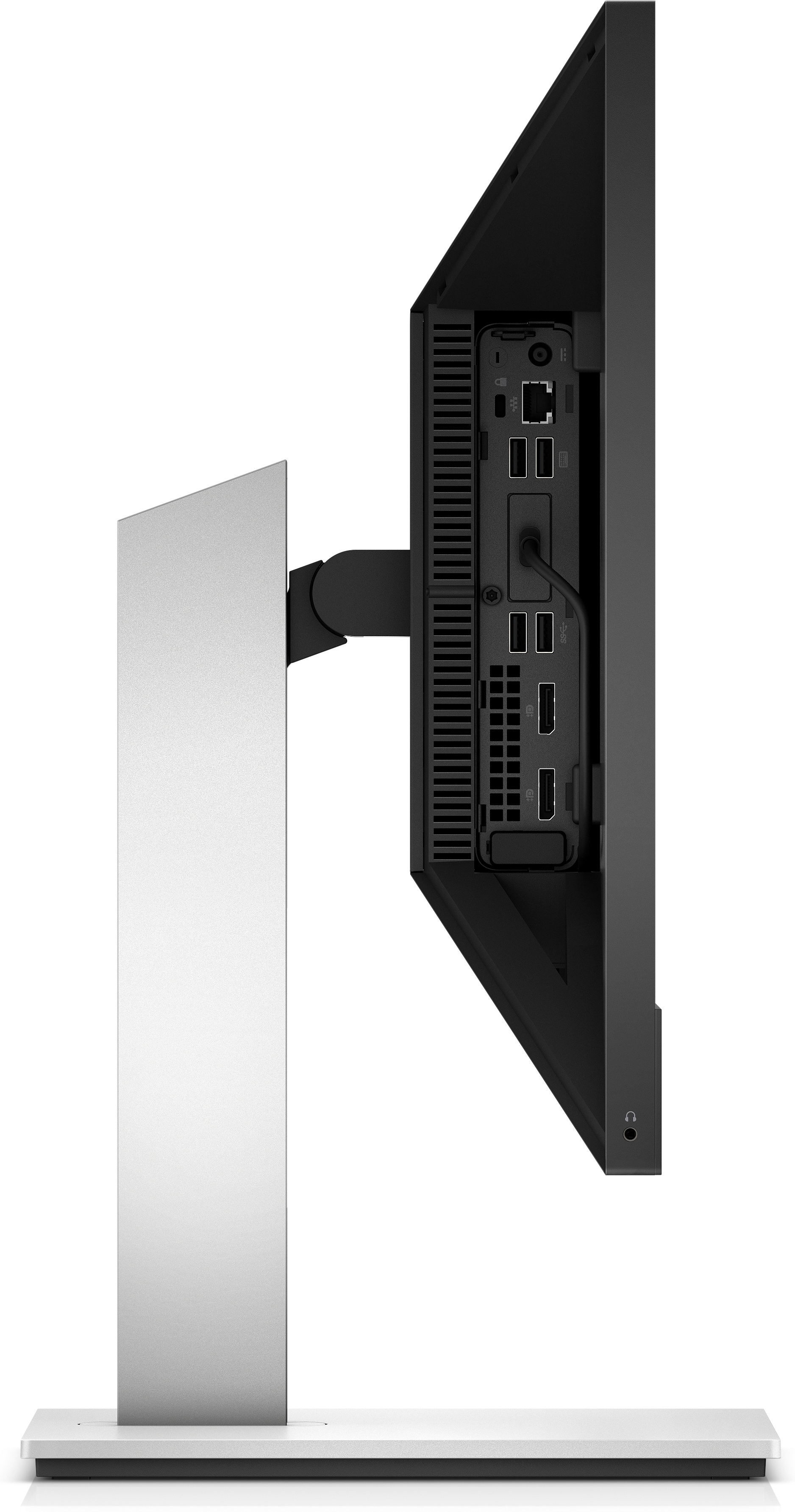 Zijaanzicht van een computermonitor. Monitor is zwart en verbonden met een mini-pc op de achterkant.