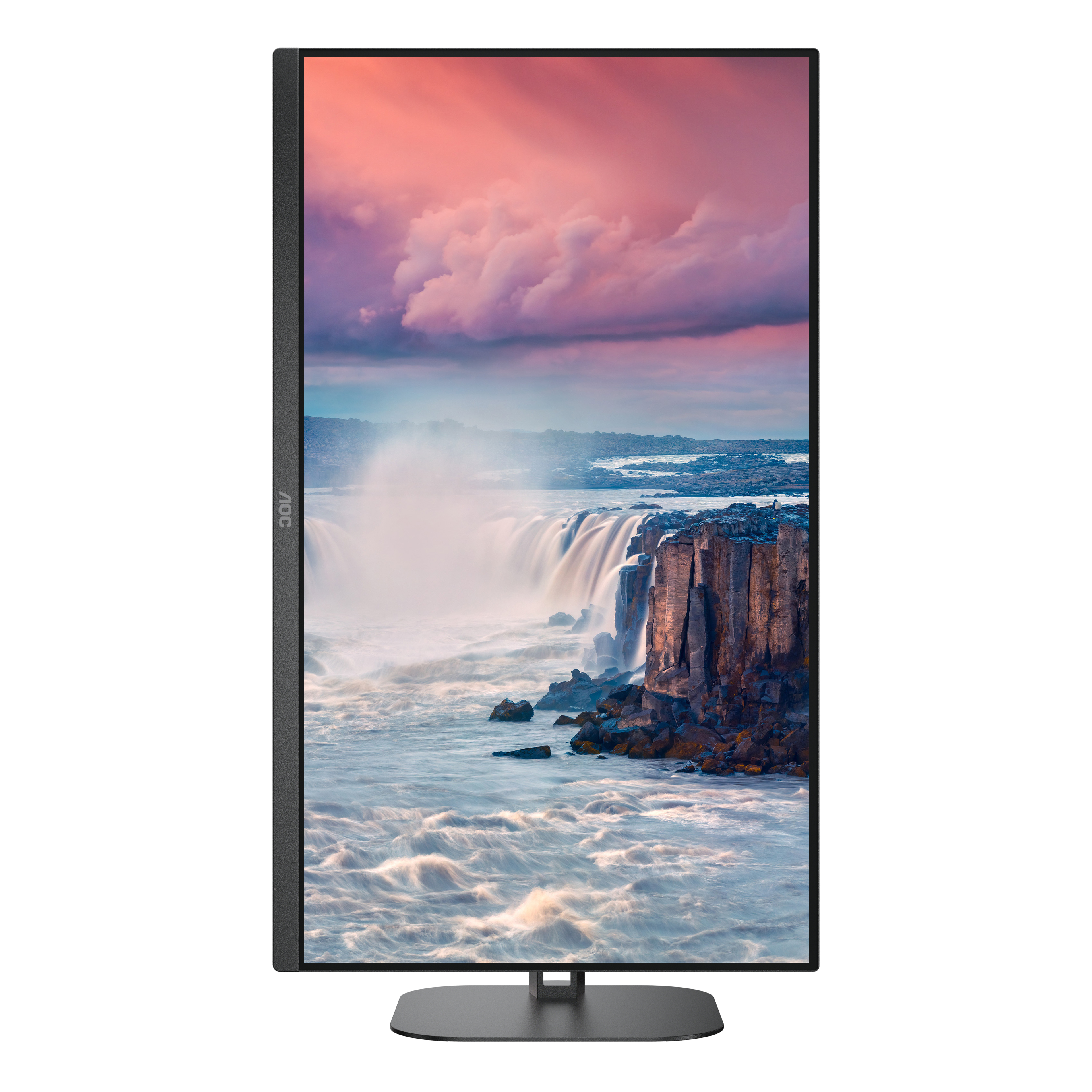 Monitor AOC muestra escena de cascada. Cielo rosa y morado, acantilados rocosos.