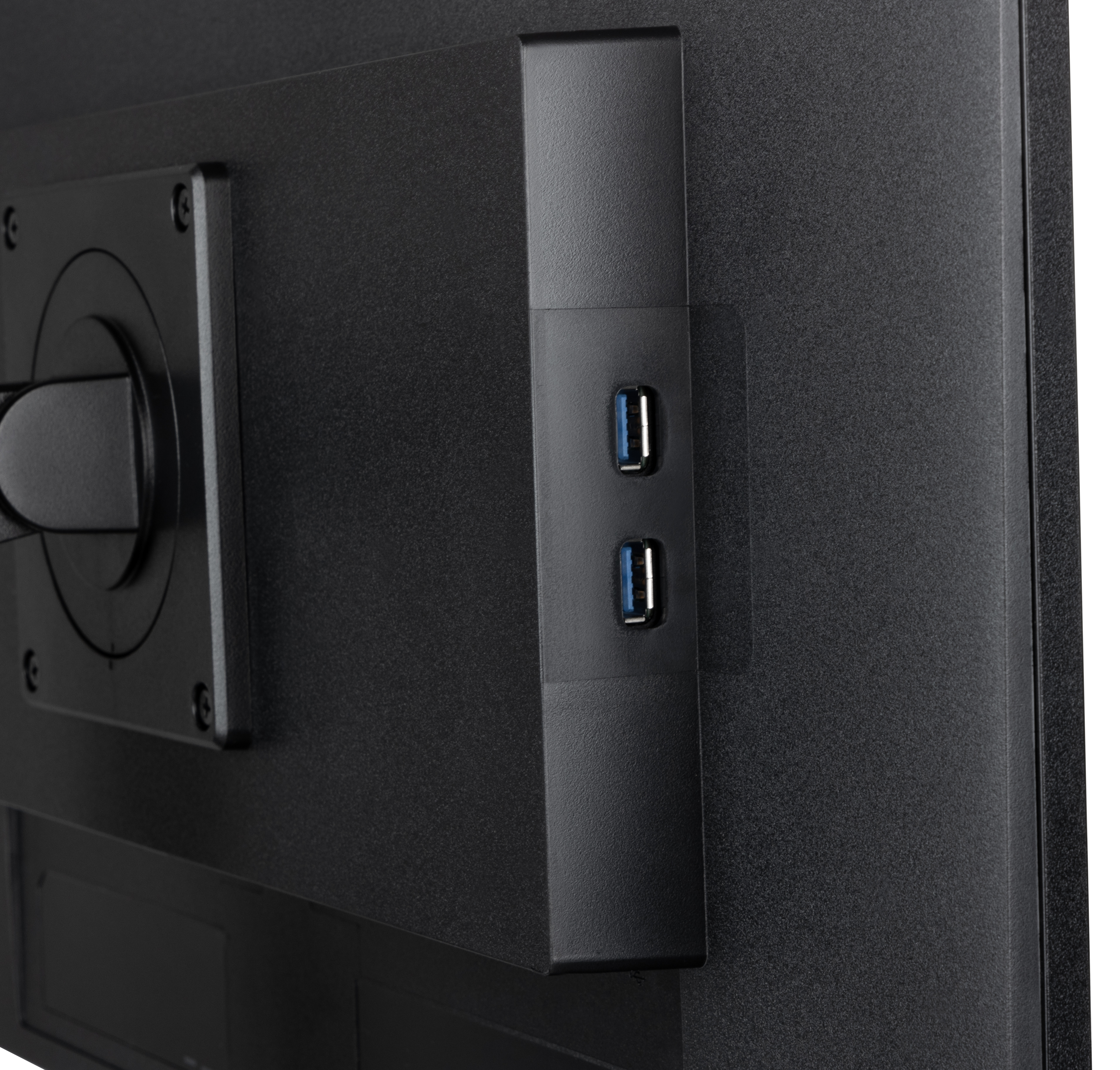 Zbliżenie tyłu monitora komputera. Widoczne są dwa porty USB.