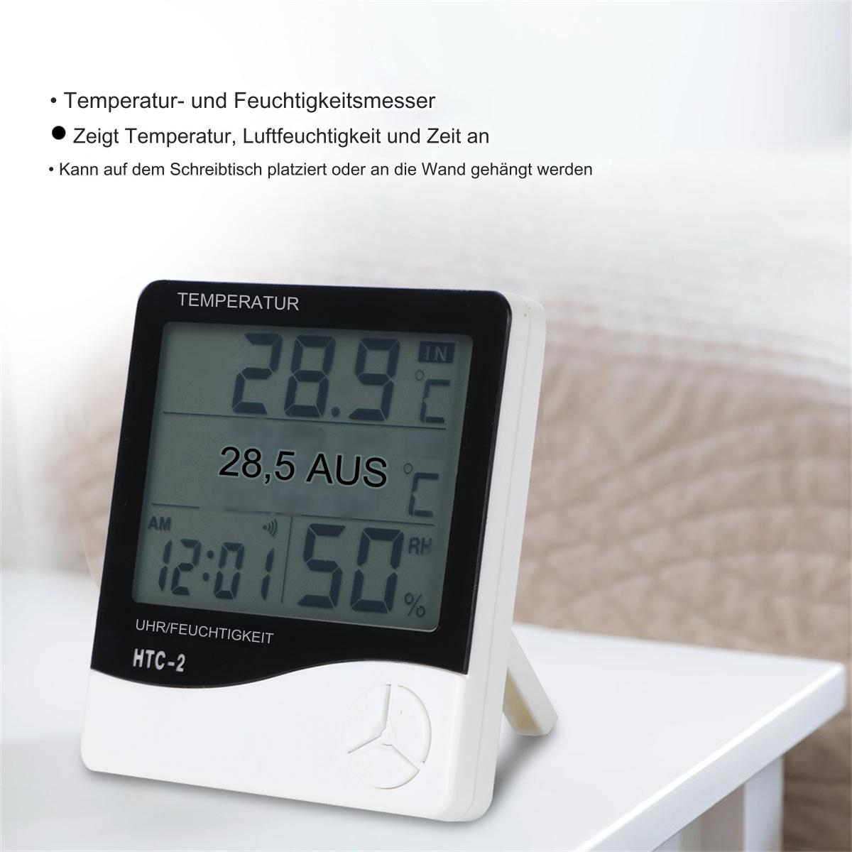 Digitales Thermometer zeigt 28,9°C an. Das Gerät zeigt Zeit und Luftfeuchtigkeit, weiß.