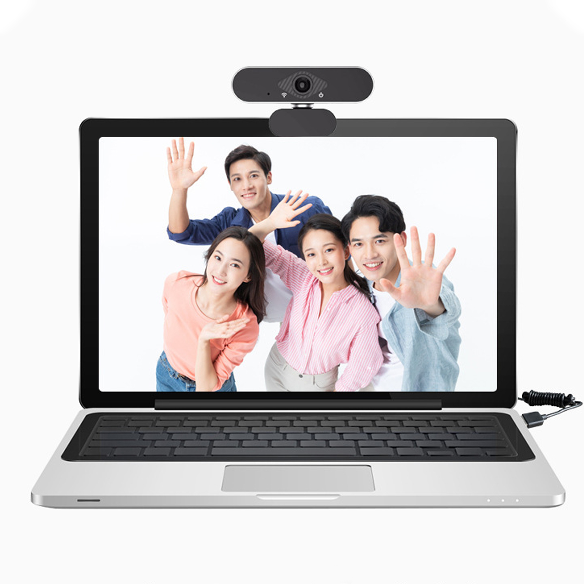 Laptopbildschirm zeigt vier winkende Personen, Webcam oben.