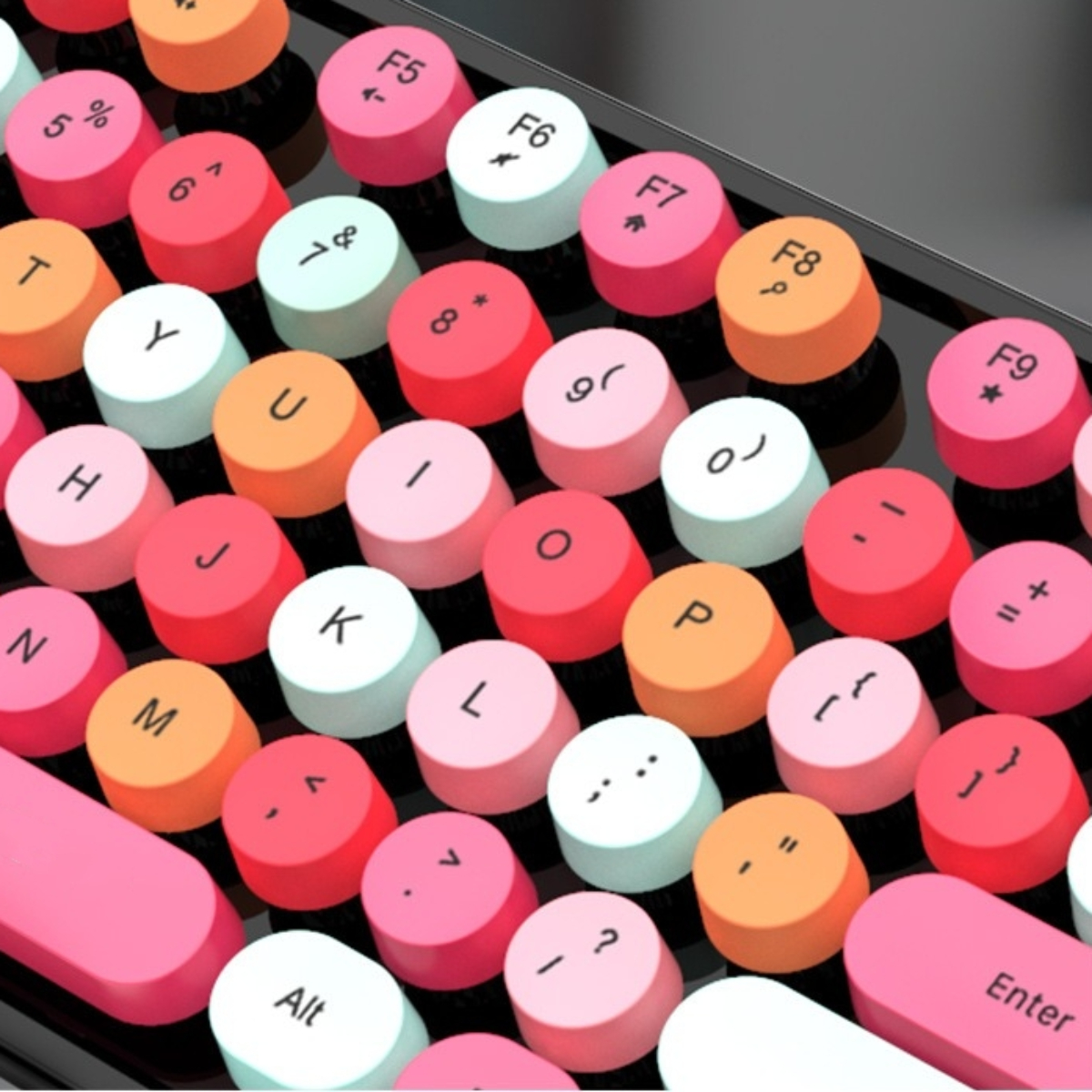 Nahaufnahme einer farbenfrohen mechanischen Tastatur mit runden Tastenkappen.