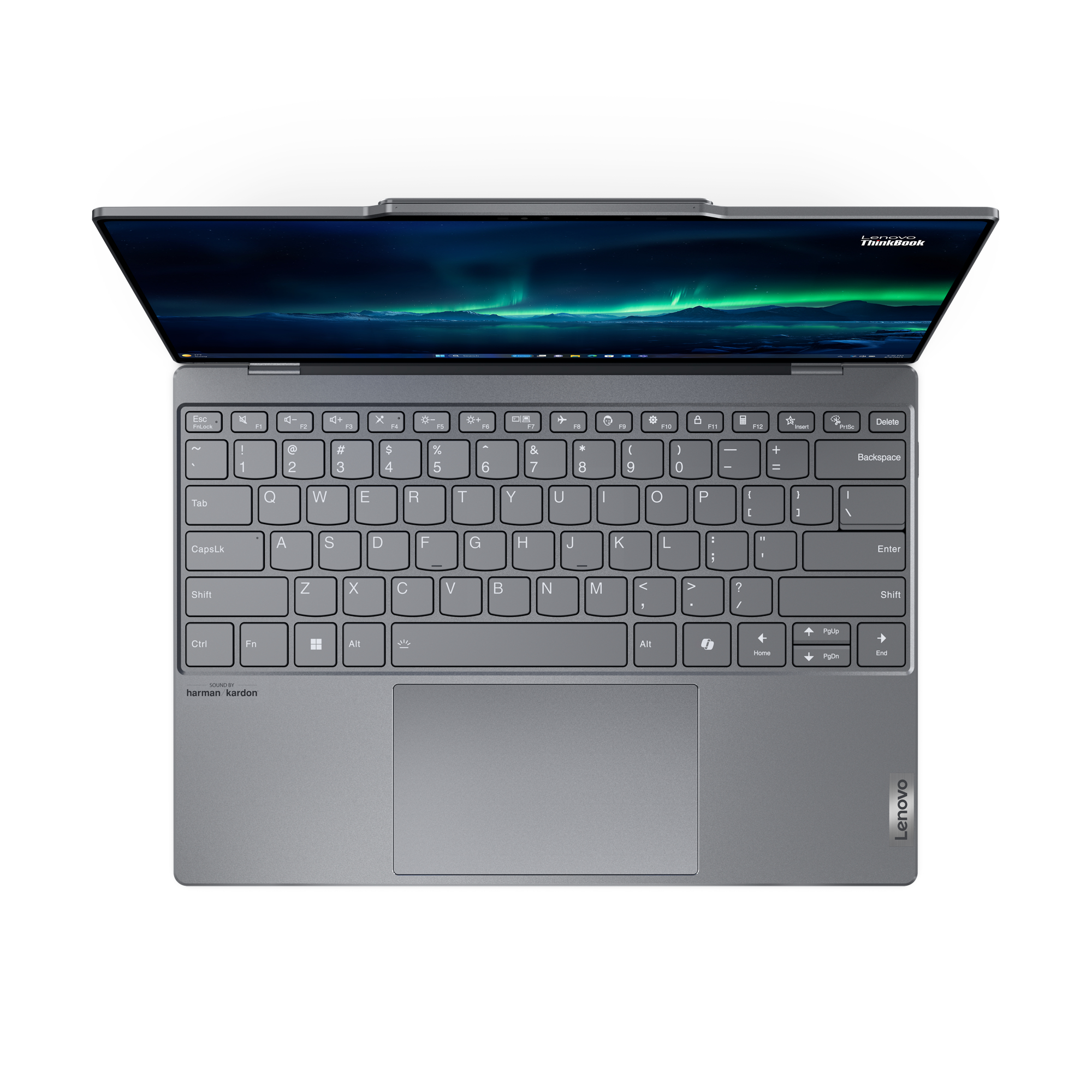 Un laptop con lo schermo aperto, che mostra un paesaggio colorato. La tastiera è visibile.