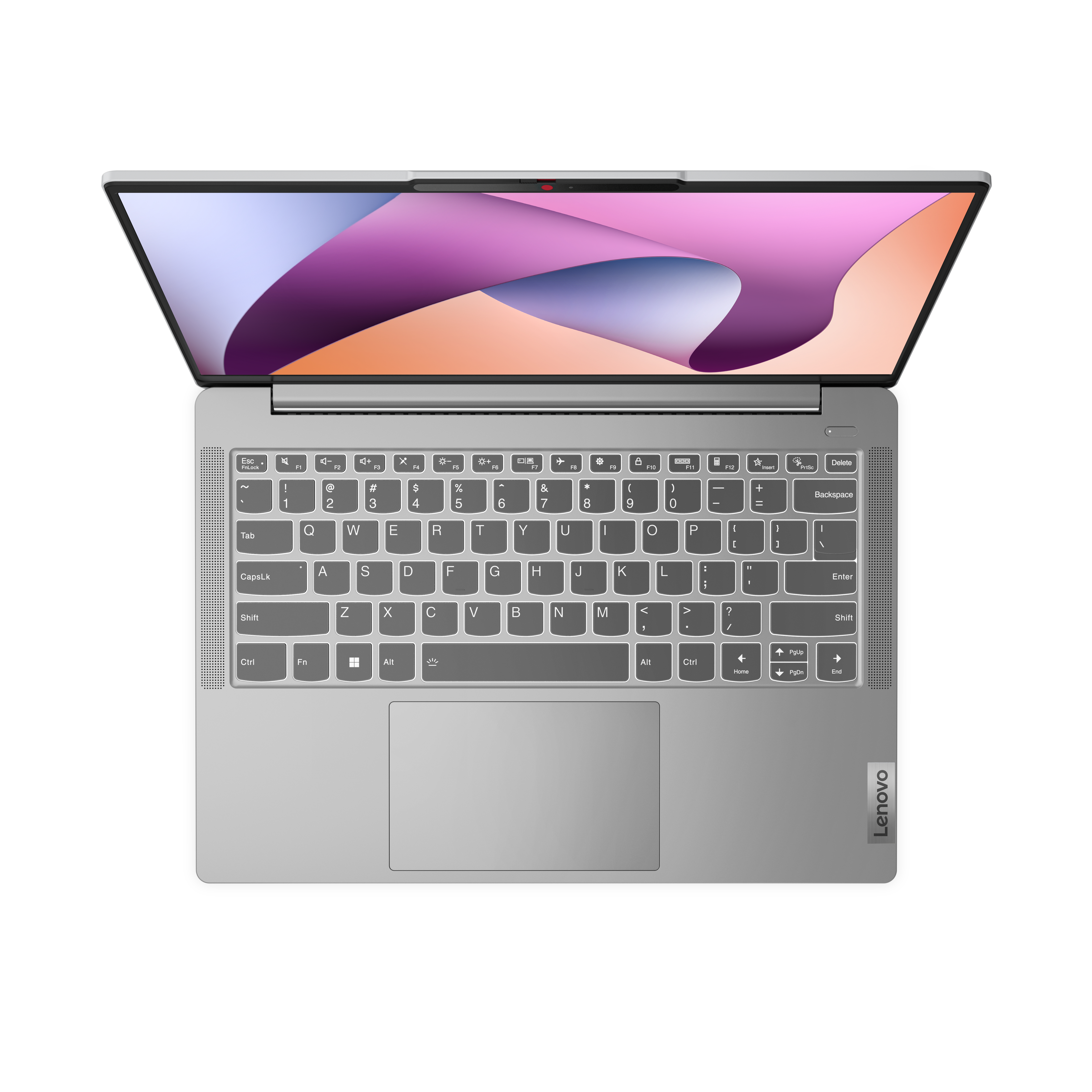 Un portátil abierto sobre una superficie blanca, que muestra el teclado, el panel táctil y la pantalla.