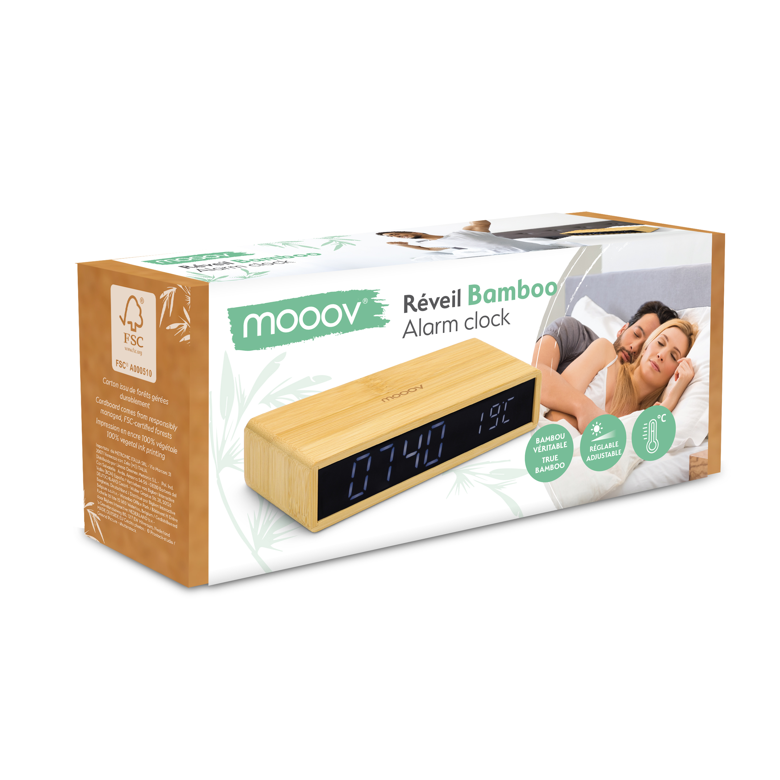 Una caja de despertador moovo. El despertador es de madera con pantalla digital. Hay una pareja.