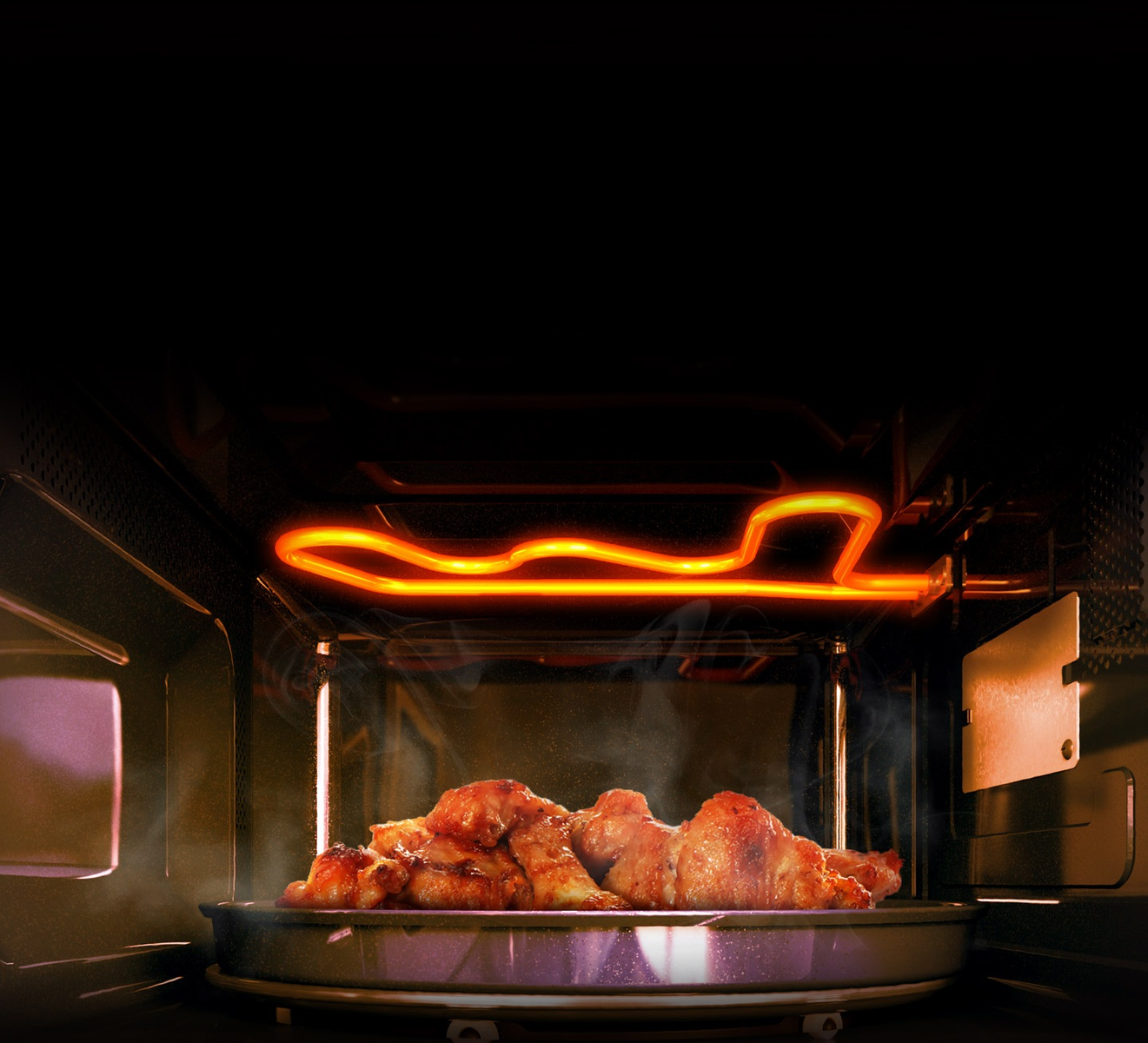 All'interno di un microonde: pezzi di pollo cotti su un piatto con un elemento riscaldante luminoso.