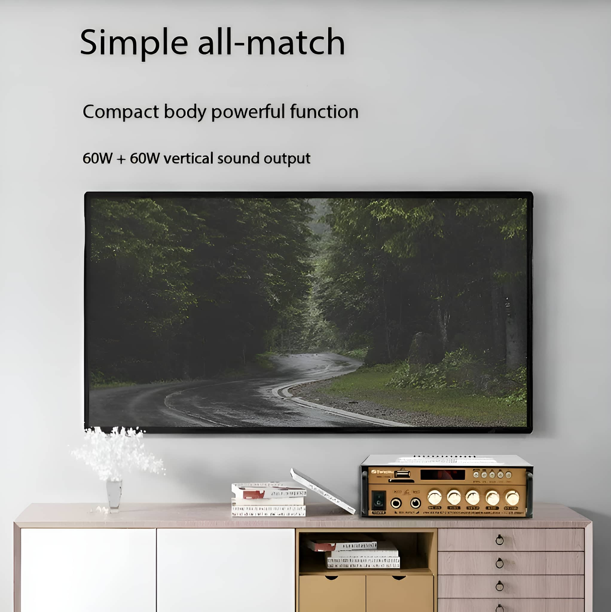 Ein modernes Unterhaltungssystem mit Fernseher, Soundsystem und Dekoration auf einem weißen Schrank.