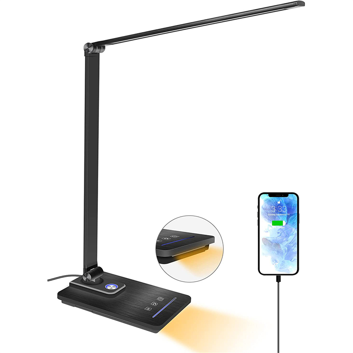 Schwarze Schreibtischlampe mit Ladestation und einem darauf ladenden Telefon.