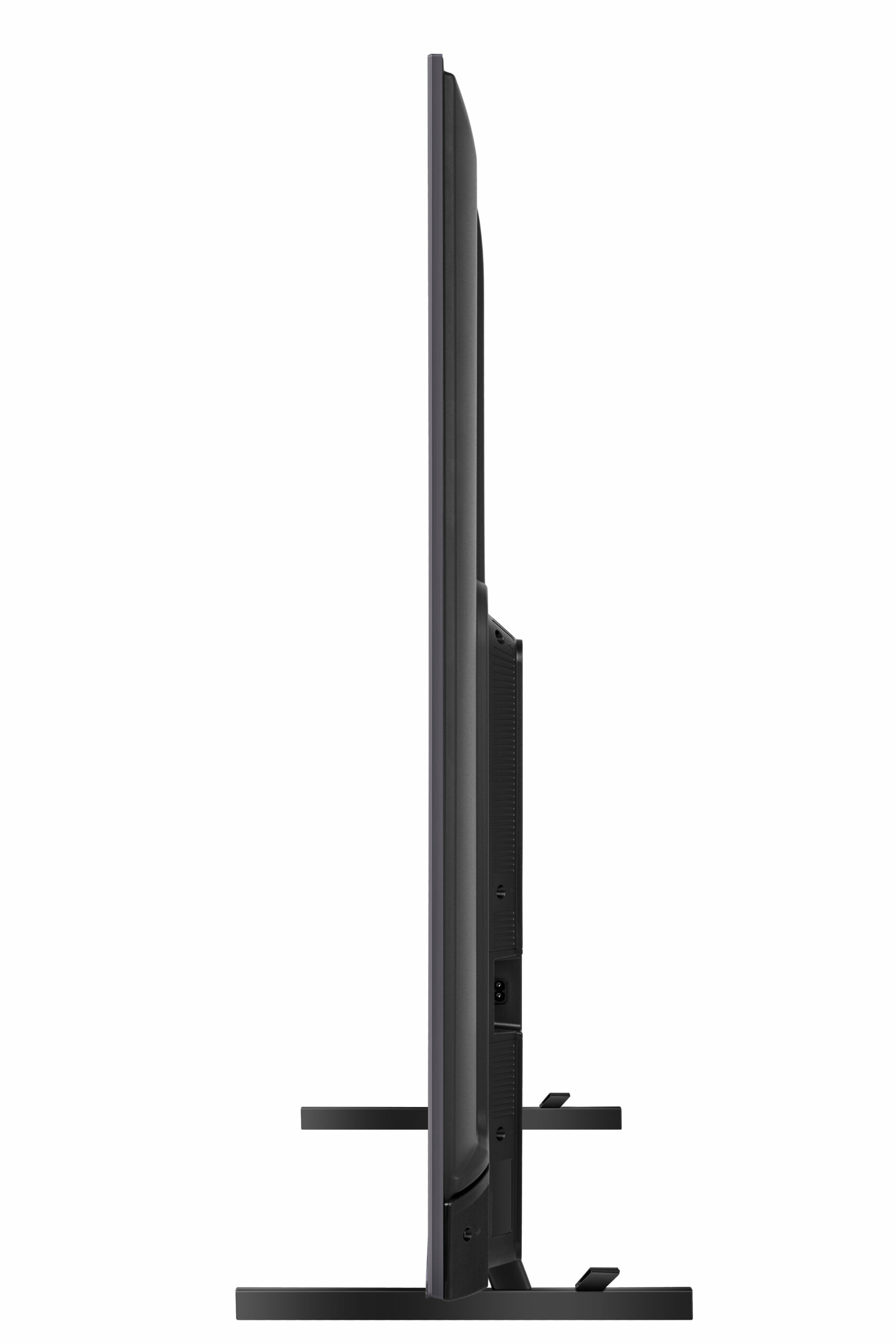 Widok z boku smukłego czarnego telewizora ze stojakiem.