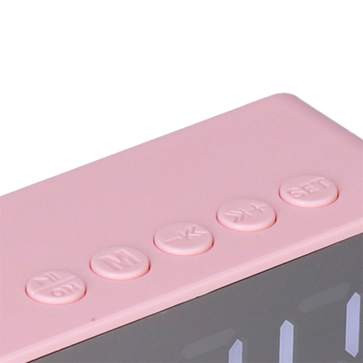Nahaufnahme eines rosa Weckers mit fünf Tasten, die mit Symbolen und dem Wort SET beschriftet sind.