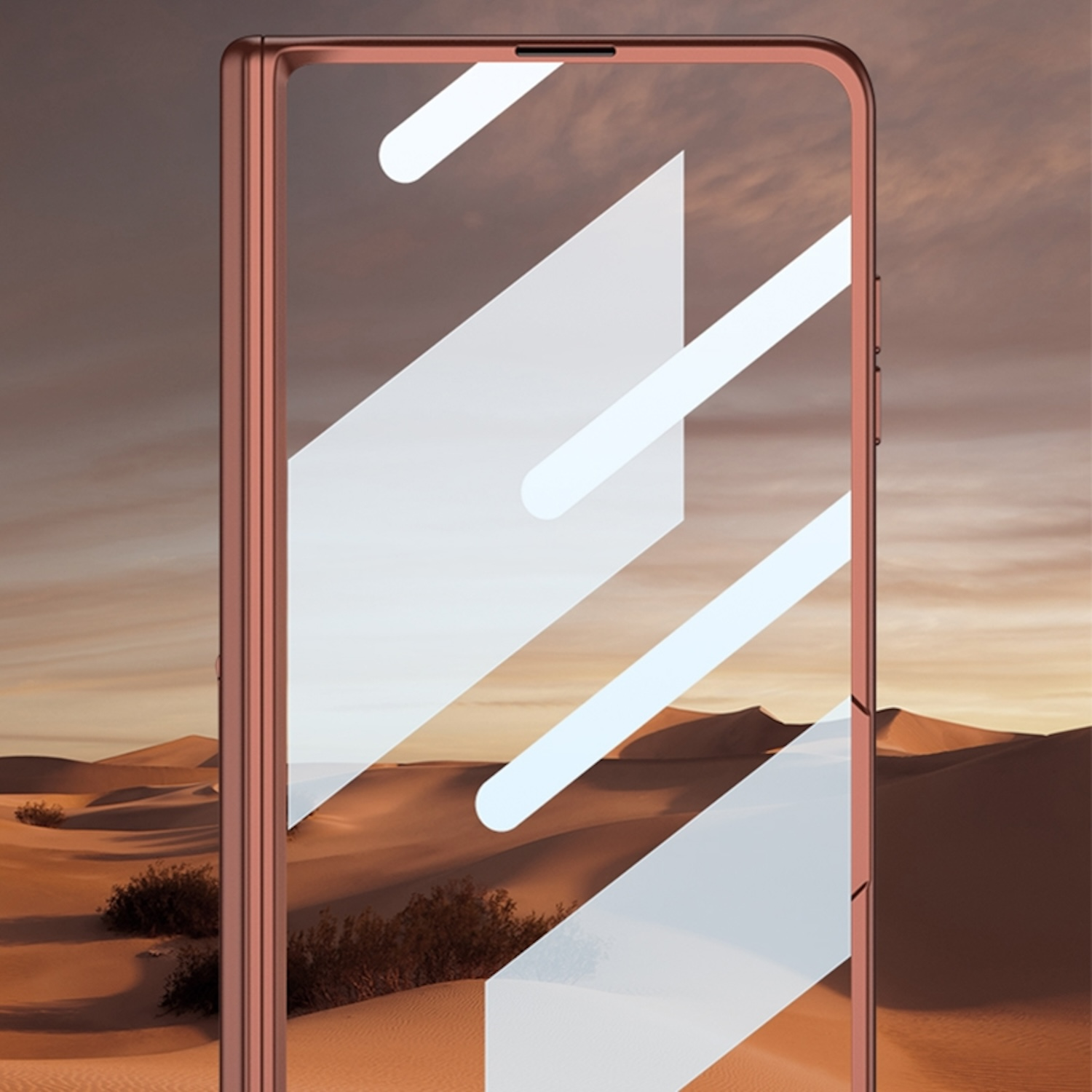 Eine Handyhülle mit einer Wüstenlandschaft, Sonnenuntergang und Sanddünen. Die Hülle ist roségoldfarben.