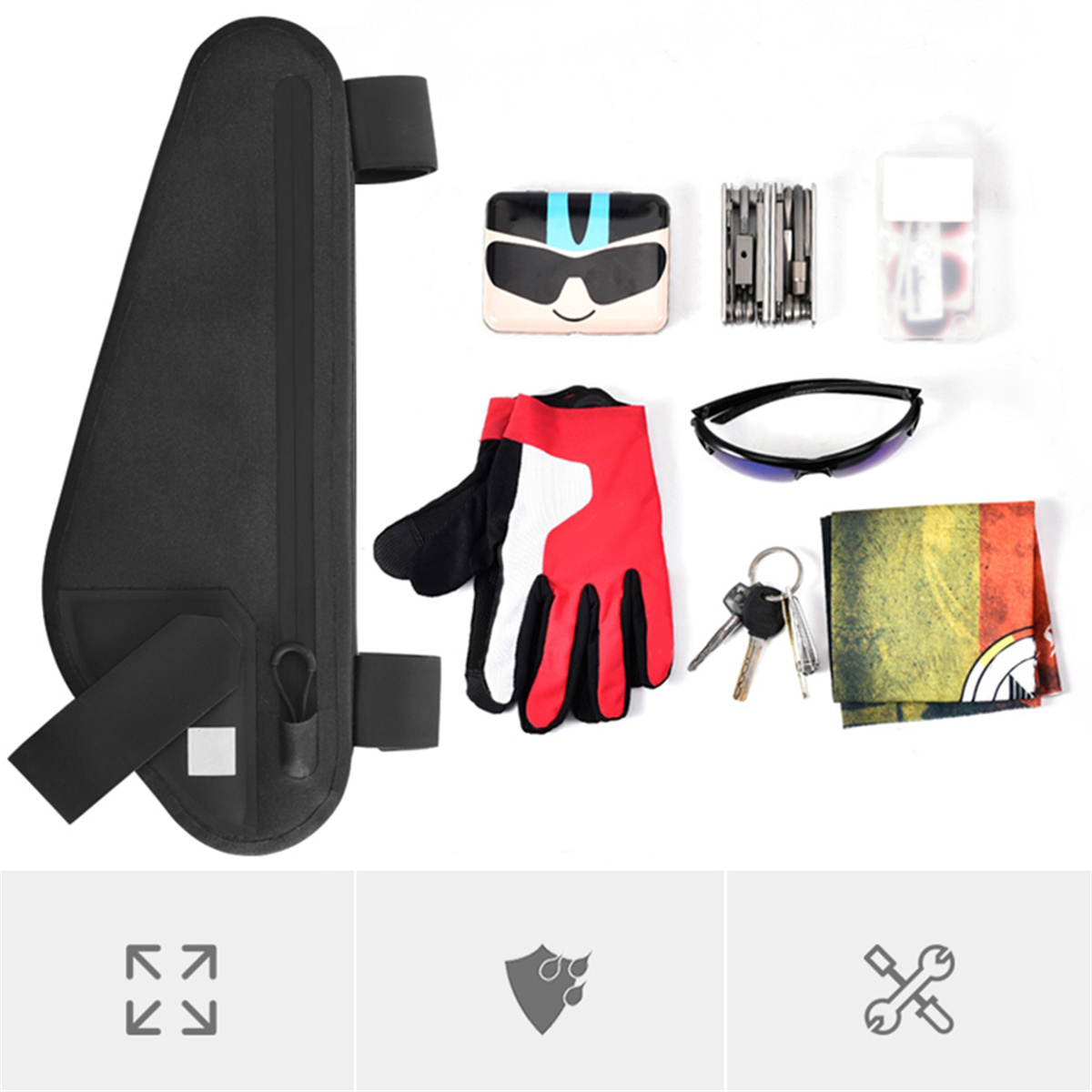 Schwarze Tasche mit Zubehör: Handschuh, Sonnenbrille, Schlüssel, Multitool und Geldbörse.