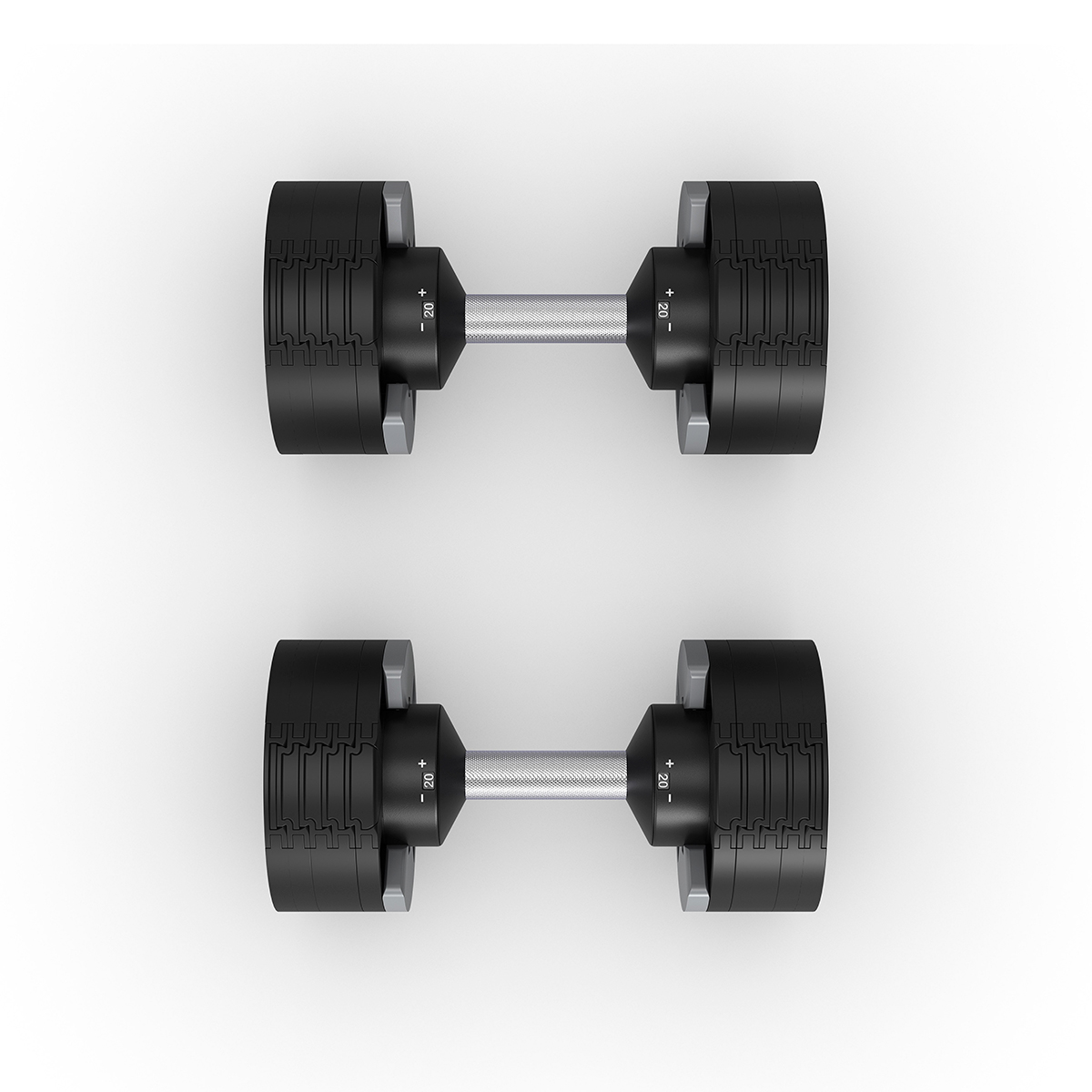 Twee zwarte verstelbare dumbbells, bovenaanzicht, op een wit oppervlak.