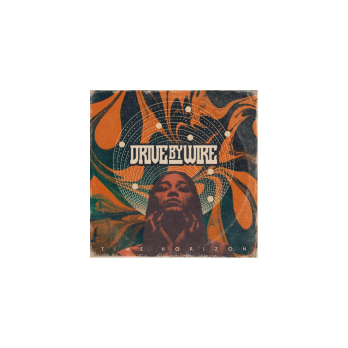 Copertina dell'album: Drive By Wire, volto di donna, design psichedelico arancione e verde.