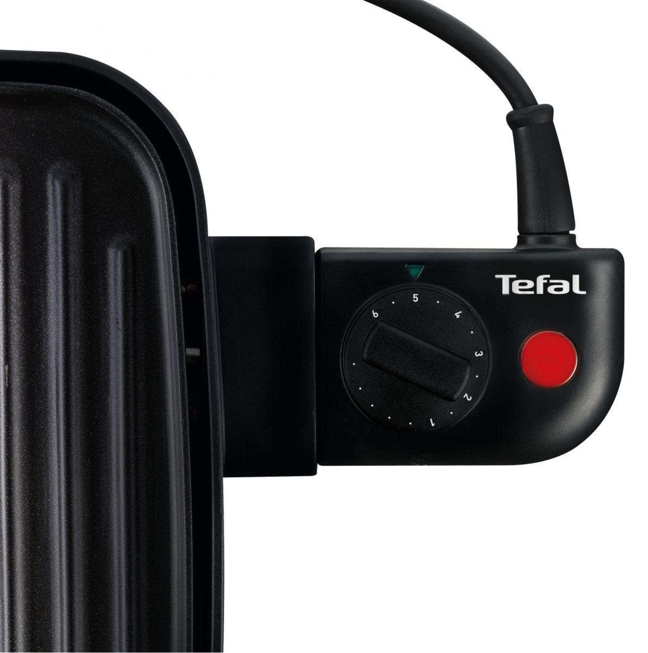 Primer plano del panel de control de una parrilla Tefal, que muestra un dial y un botón de encendido.