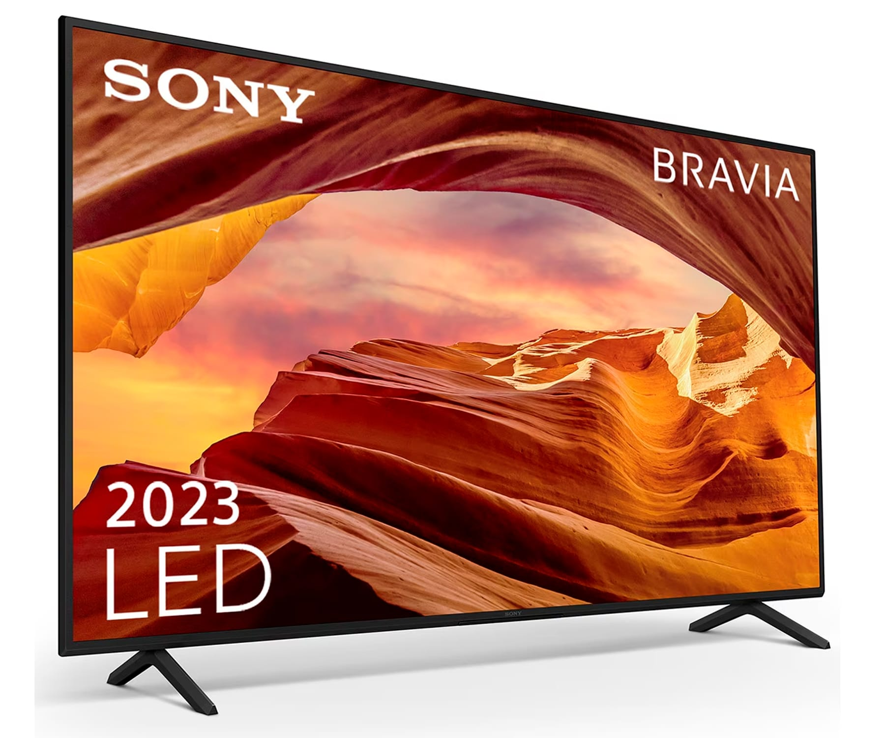 Sony Bravia TV. Display zeigt eine Wüstenlandschaft. Schwarzer Rahmen, schwarzer Ständer. Weißer Hintergrund.