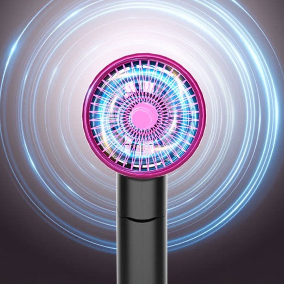 Ein Ventilator mit rosa und blauem Lichtdesign, der einen Wirbeleffekt erzeugt.