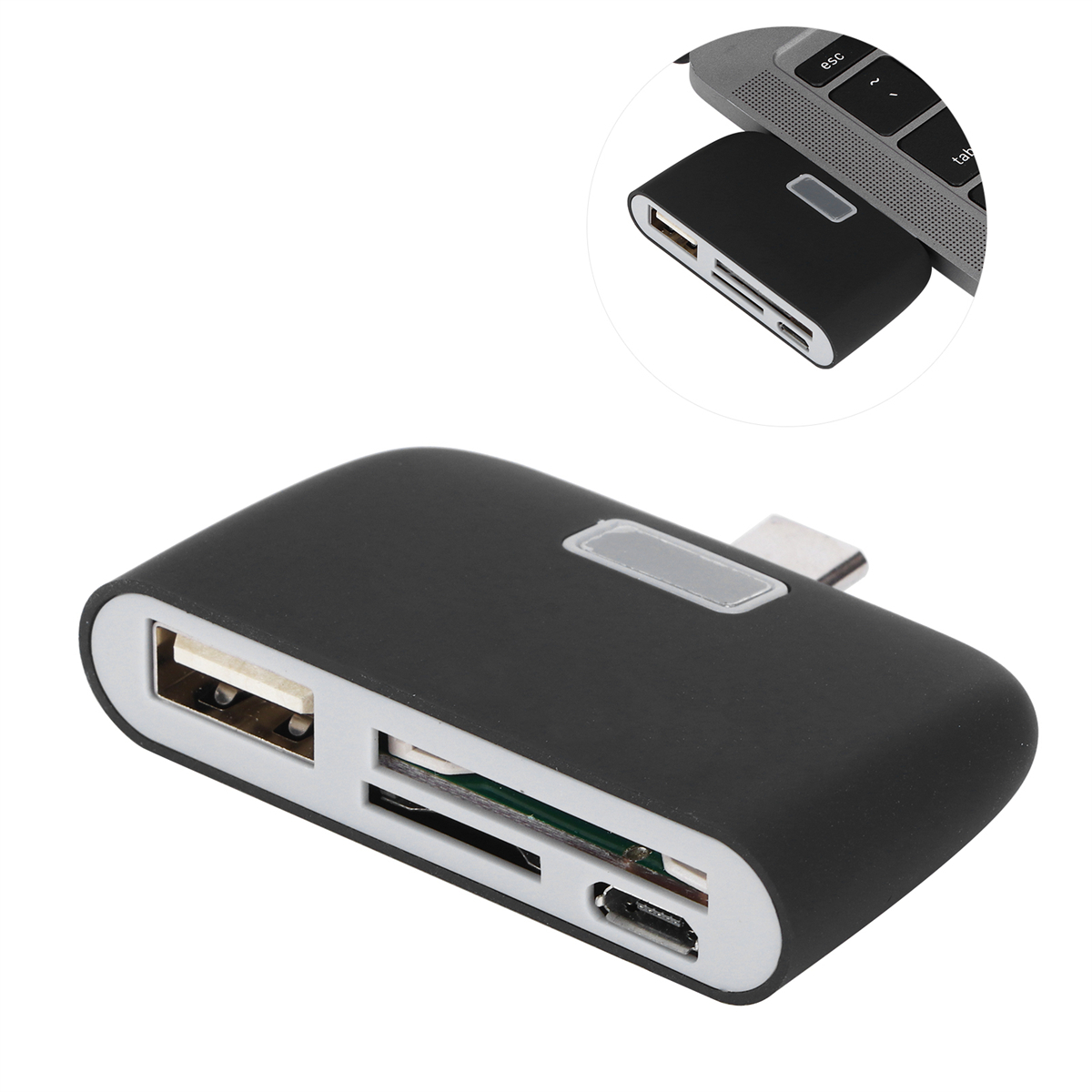 Schwarzer Kartenleser mit USB- und USB-C-Anschlüssen. Im Hintergrund ist ein Laptop zu sehen.