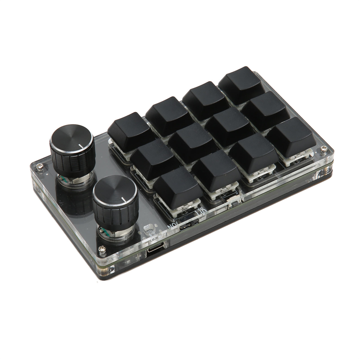 Ein kleines schwarzes Keypad mit Tasten und zwei Drehreglern auf klarer Basis.