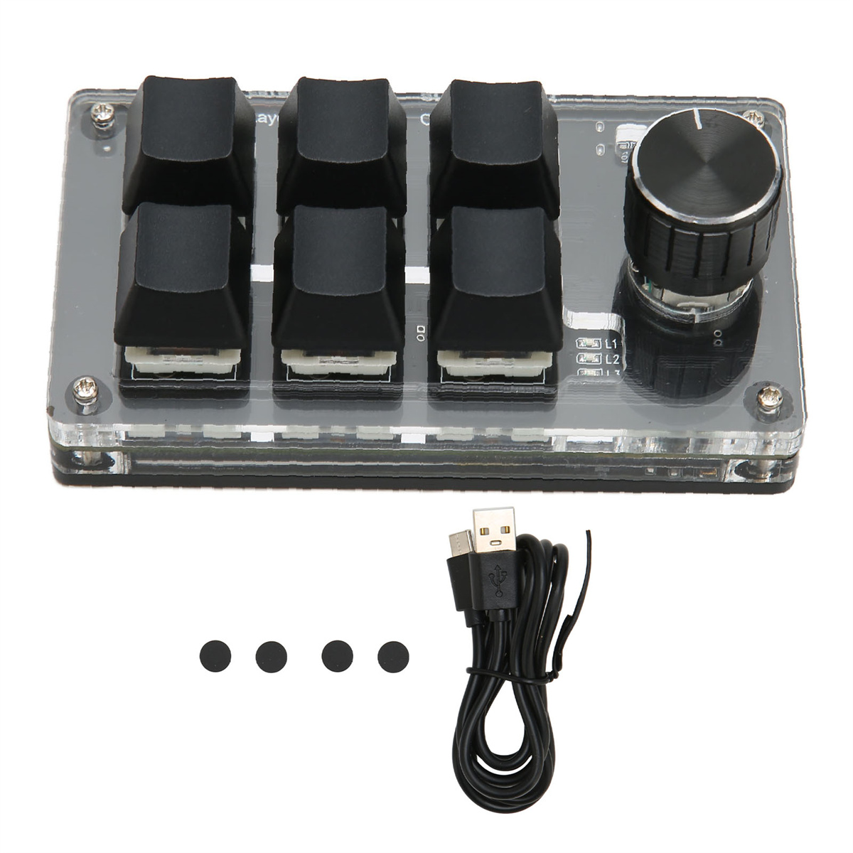 Ein schwarzes Tastaturgerät mit sechs Tasten und einem Drehregler. Ein USB-Kabel und Gummifüße sind abgebildet.