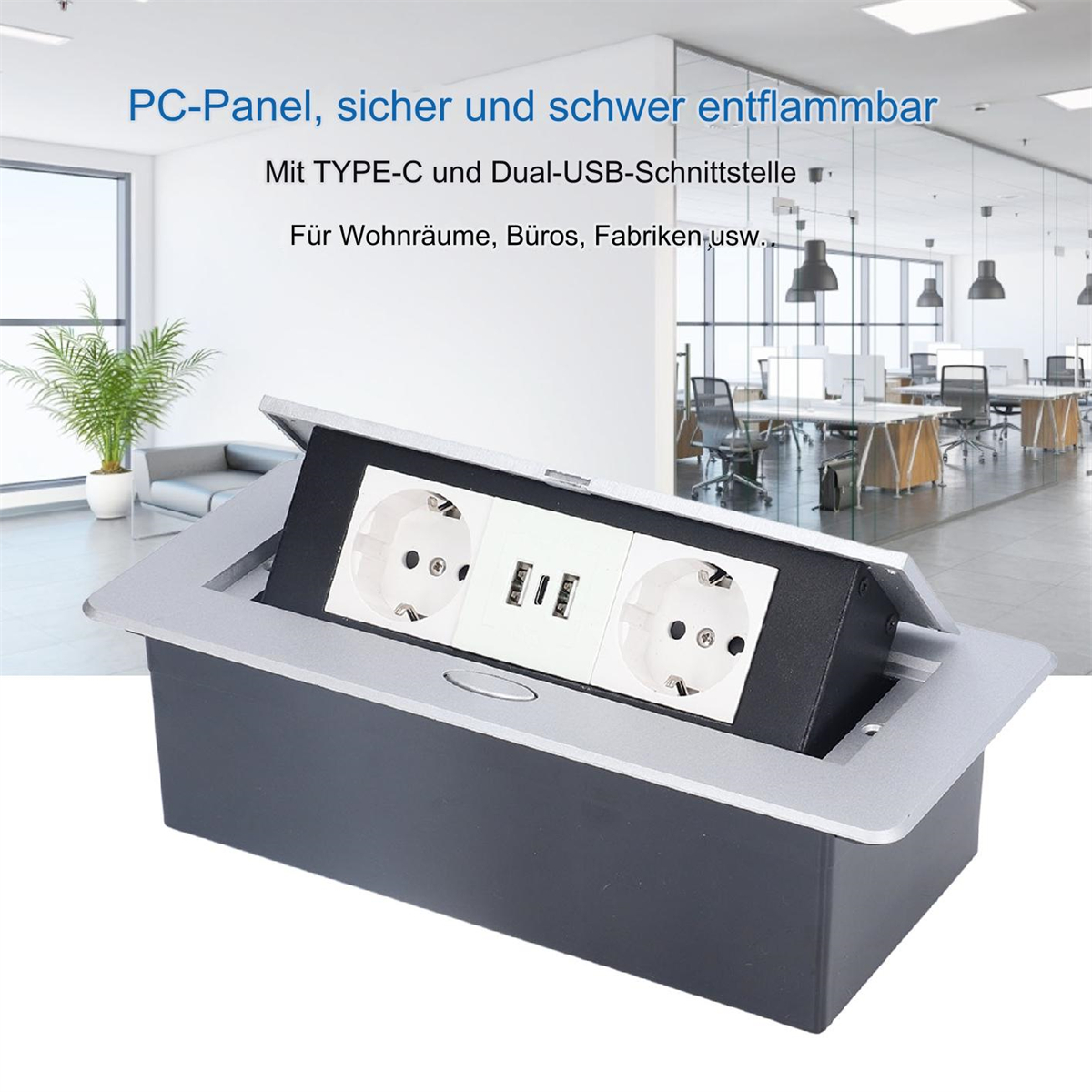 Eine versenkte Steckdose mit USB-Anschlüssen, geöffnet. Es ist in einer Wand mit einer Pflanze im Hintergrund.