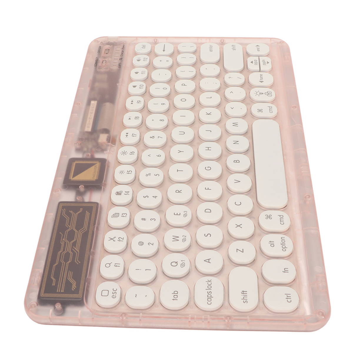 Eine transparente rosa Tastatur mit weißen, kreisförmigen Tasten. Elektronische Komponenten sind sichtbar.