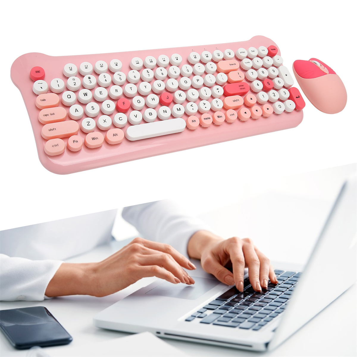 Rosa Tastatur und Maus. Die Hände einer Person tippen auf einem Laptop. Weißer Tisch und Hintergrund.