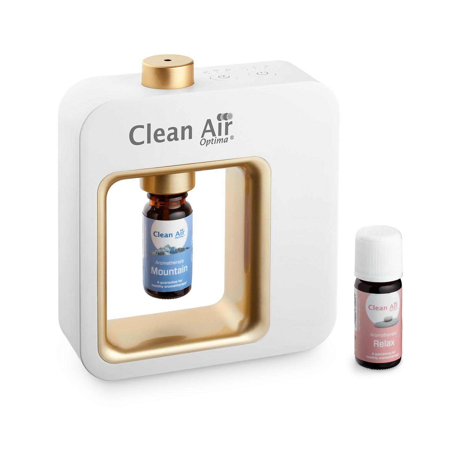 Ein weißer und goldener Aromatherapie-Diffusor mit zwei ätherischen Ölflaschen auf weißer Oberfläche.