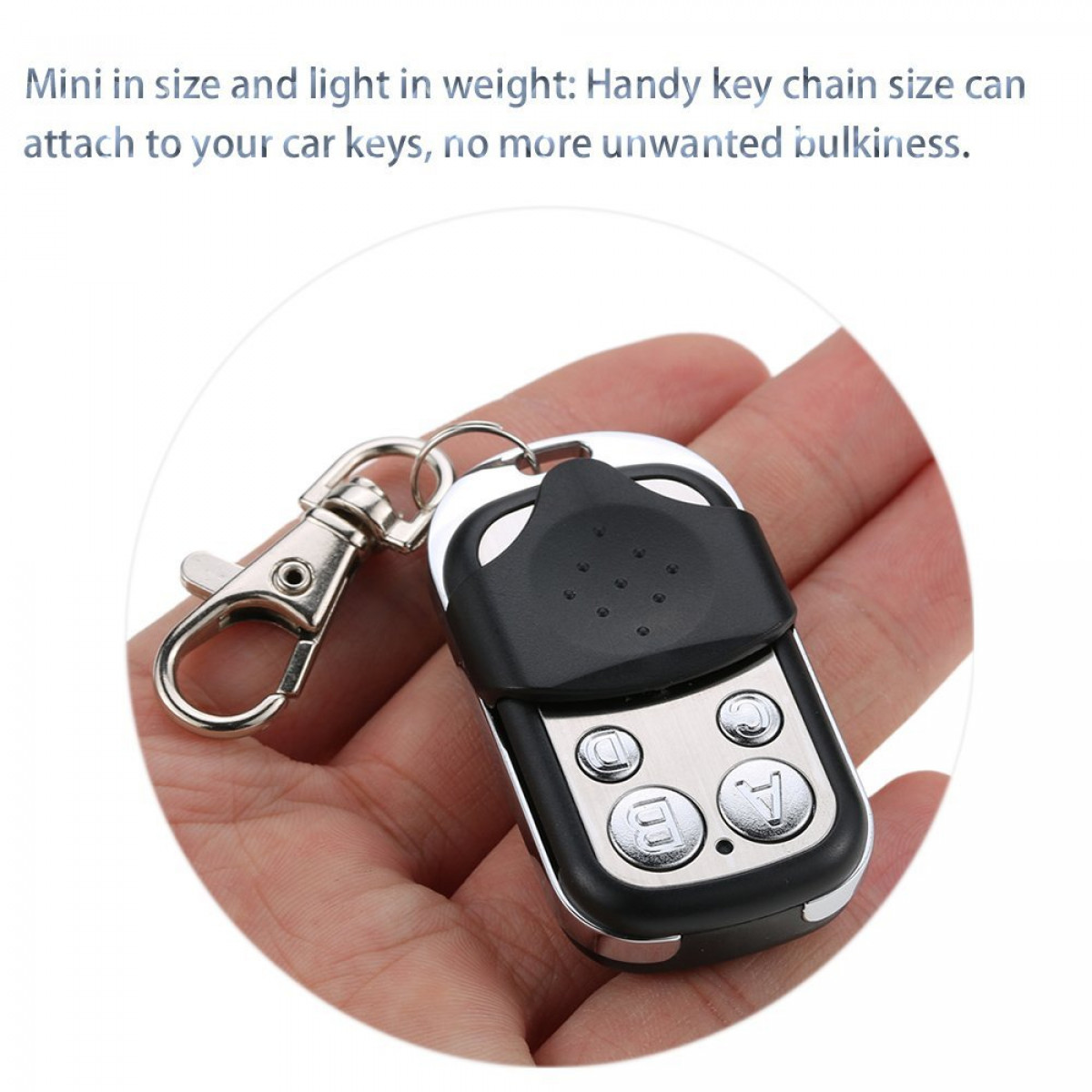 Pilot do kluczy z czterema przyciskami, czarno-srebrny design.