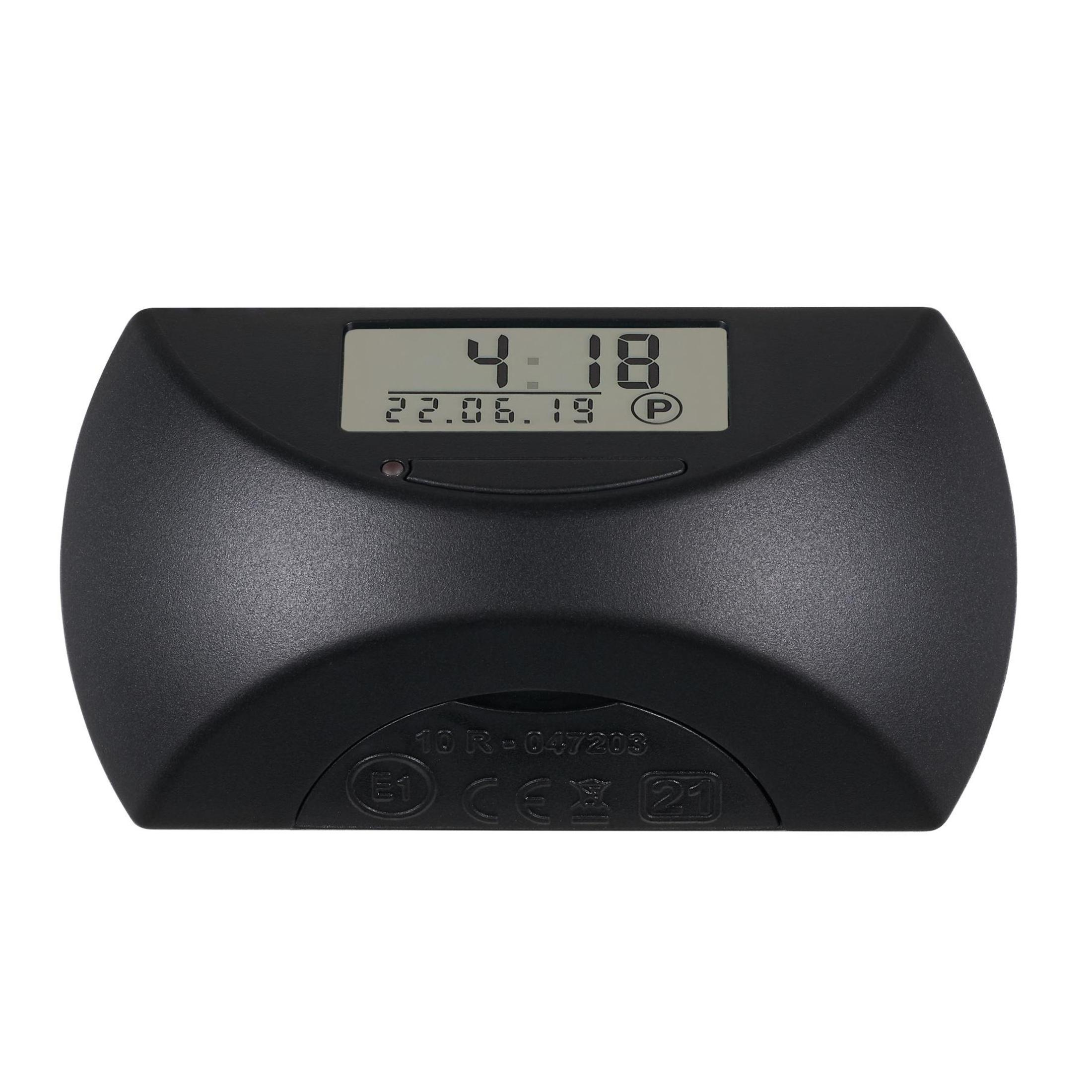 Eine schwarze, rechteckige Digitaluhr, die 4:18 und das Datum anzeigt. Sie hat Knöpfe und ein Display.