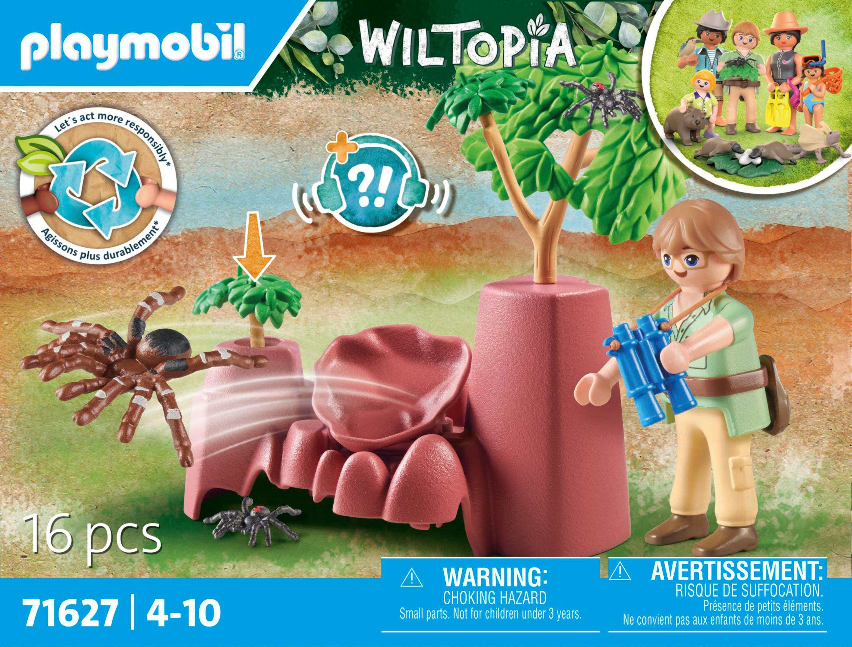 Set Playmobil Wildtopia. Mostra un uomo con binocolo, ragni e alberi giocattolo.