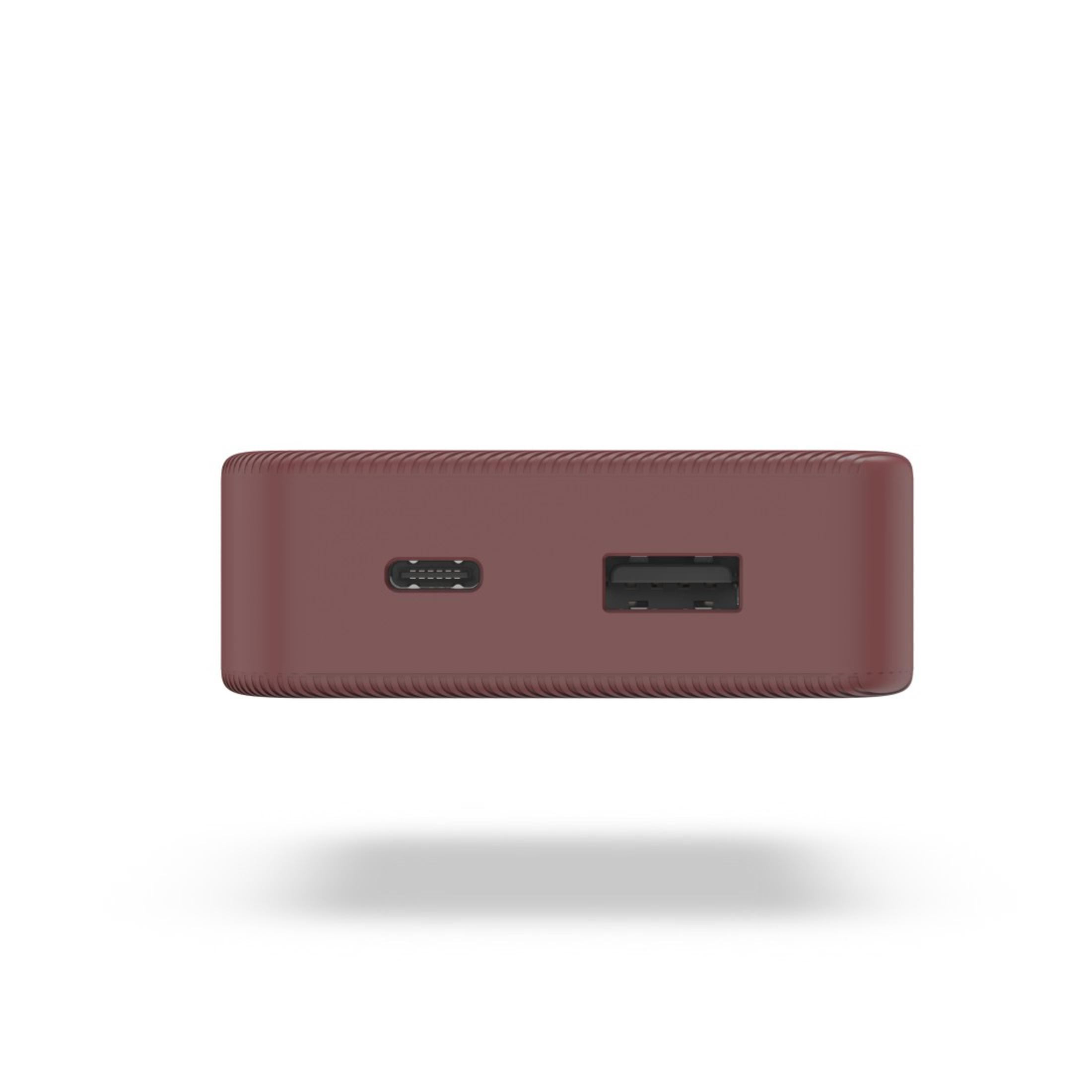 Dispositivo rettangolare marrone con una porta USB e USB-C. Sfondo bianco. Vista dall'alto.