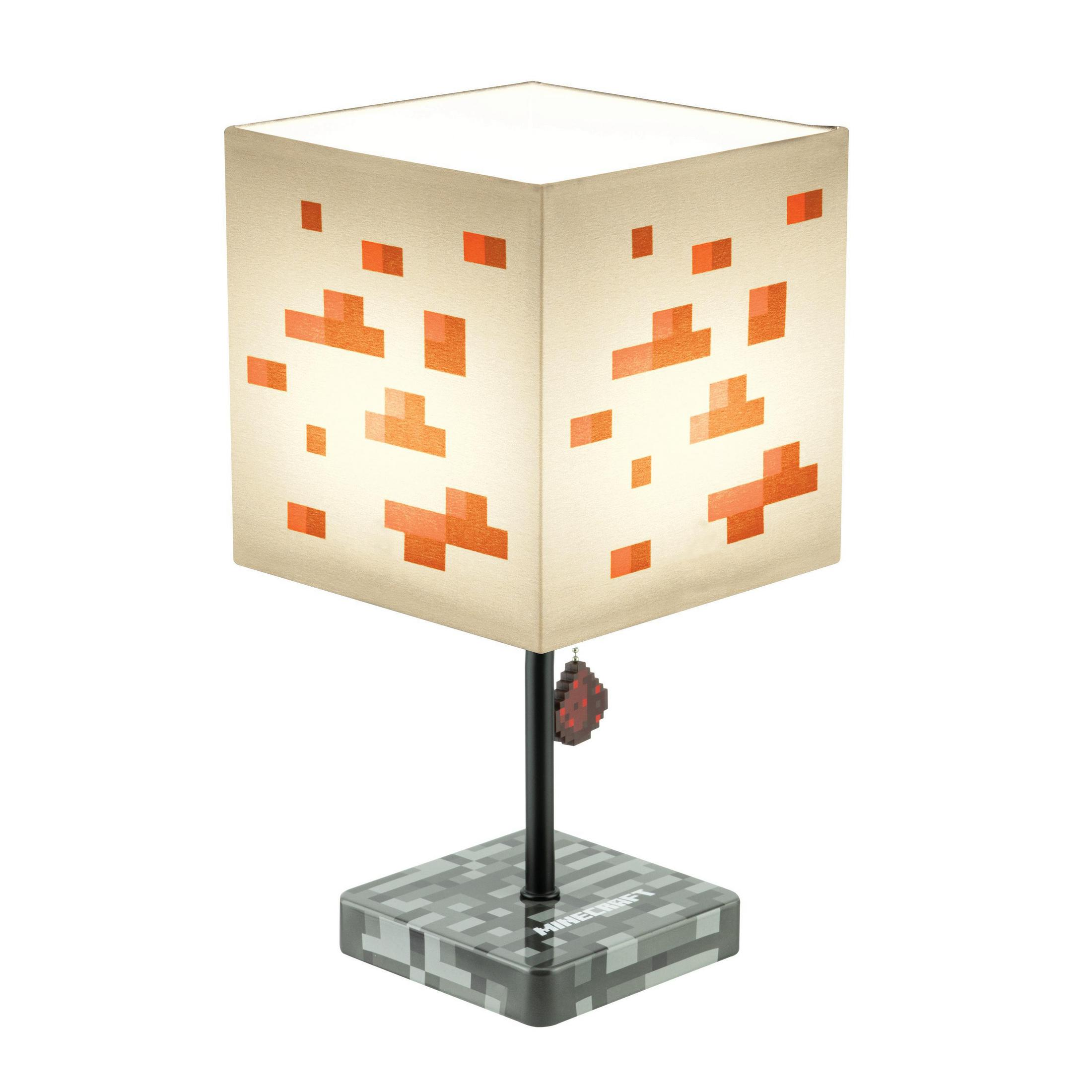 Minecraft-Lampe mit einem Würfelschirm. Die Basis ist grau, der Schirm hat ein orangefarbenes Pixelmuster.