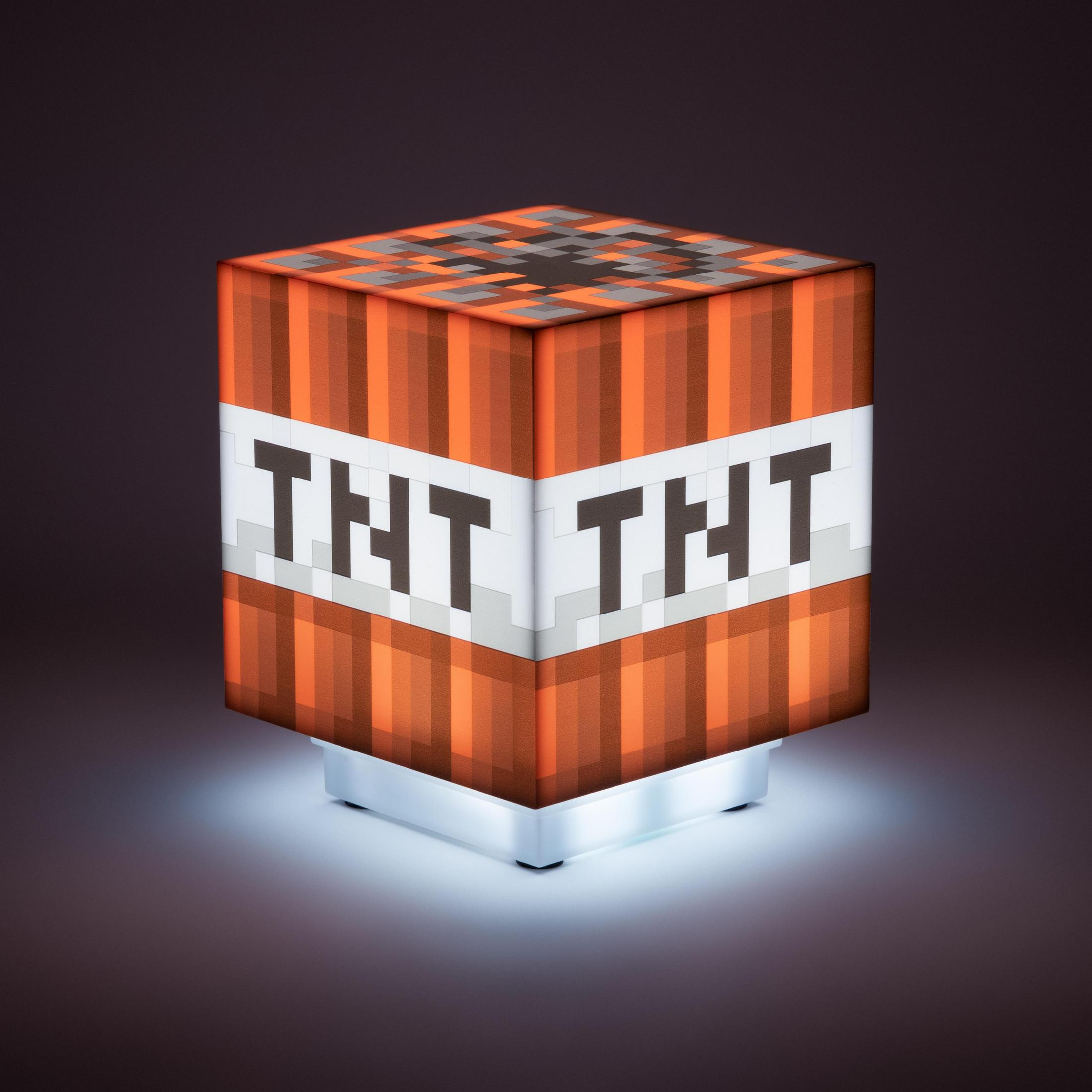 Lampa TNT z Minecraft. To kostka z tekstem TNT, oświetlona od dołu.