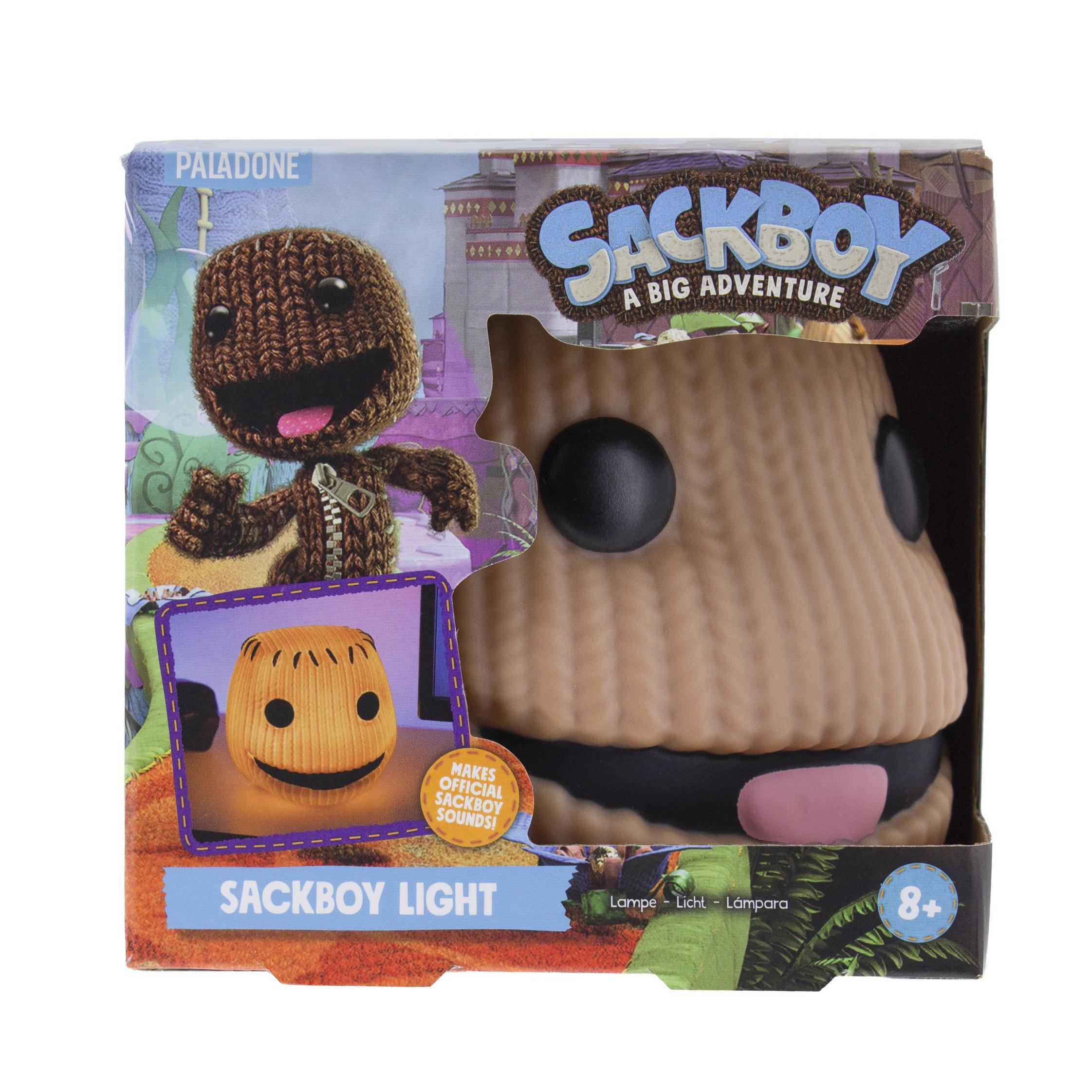 Sackboy Light Lampe in einer Box. Die Box hat eine Sackboy-Figur und den Text: 'Sackboy Light.' Die Lampe ist beleuchtet.