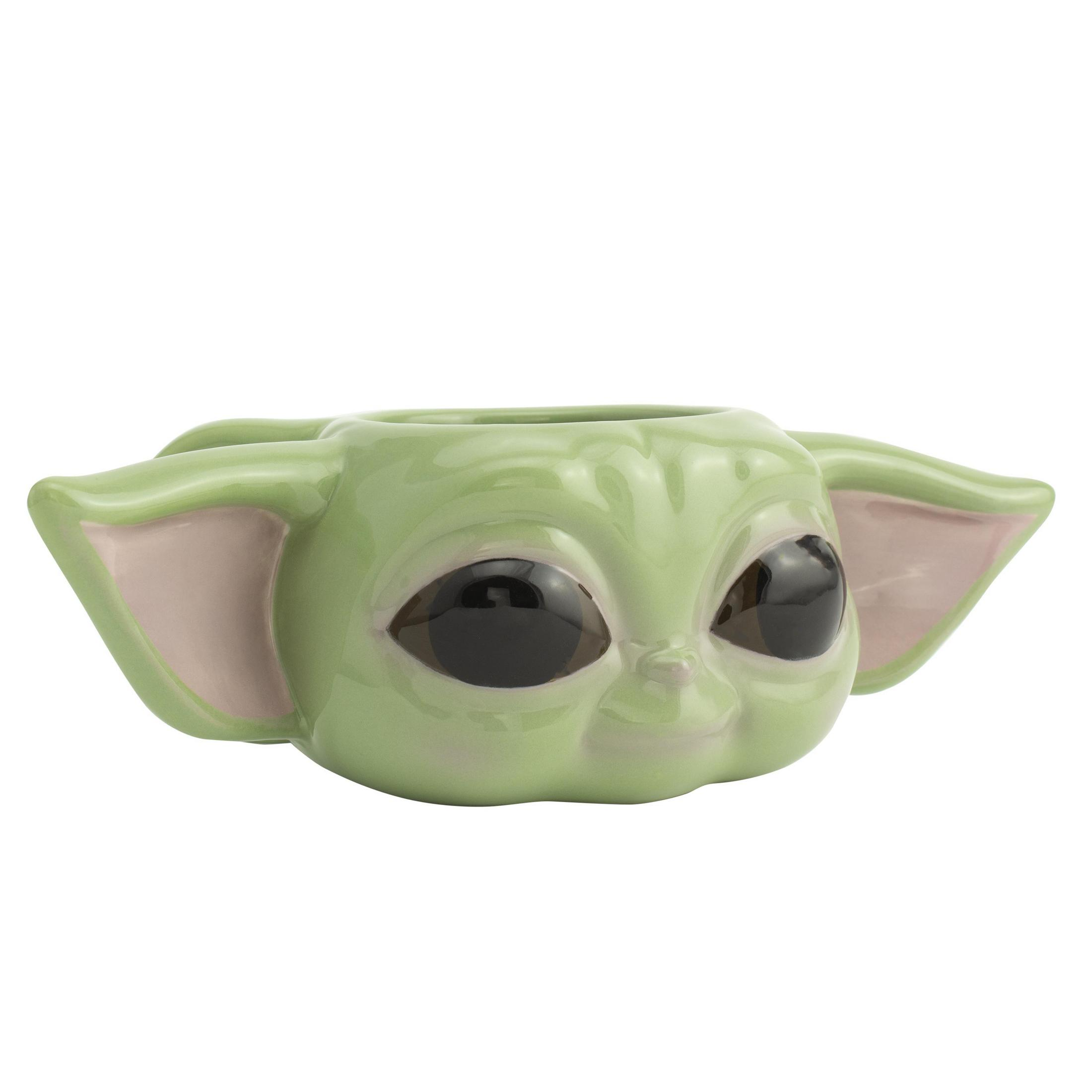 Grüner Baby-Yoda-Pflanzentopf mit großen Augen und Ohren. Er hat ein glänzendes Finish.