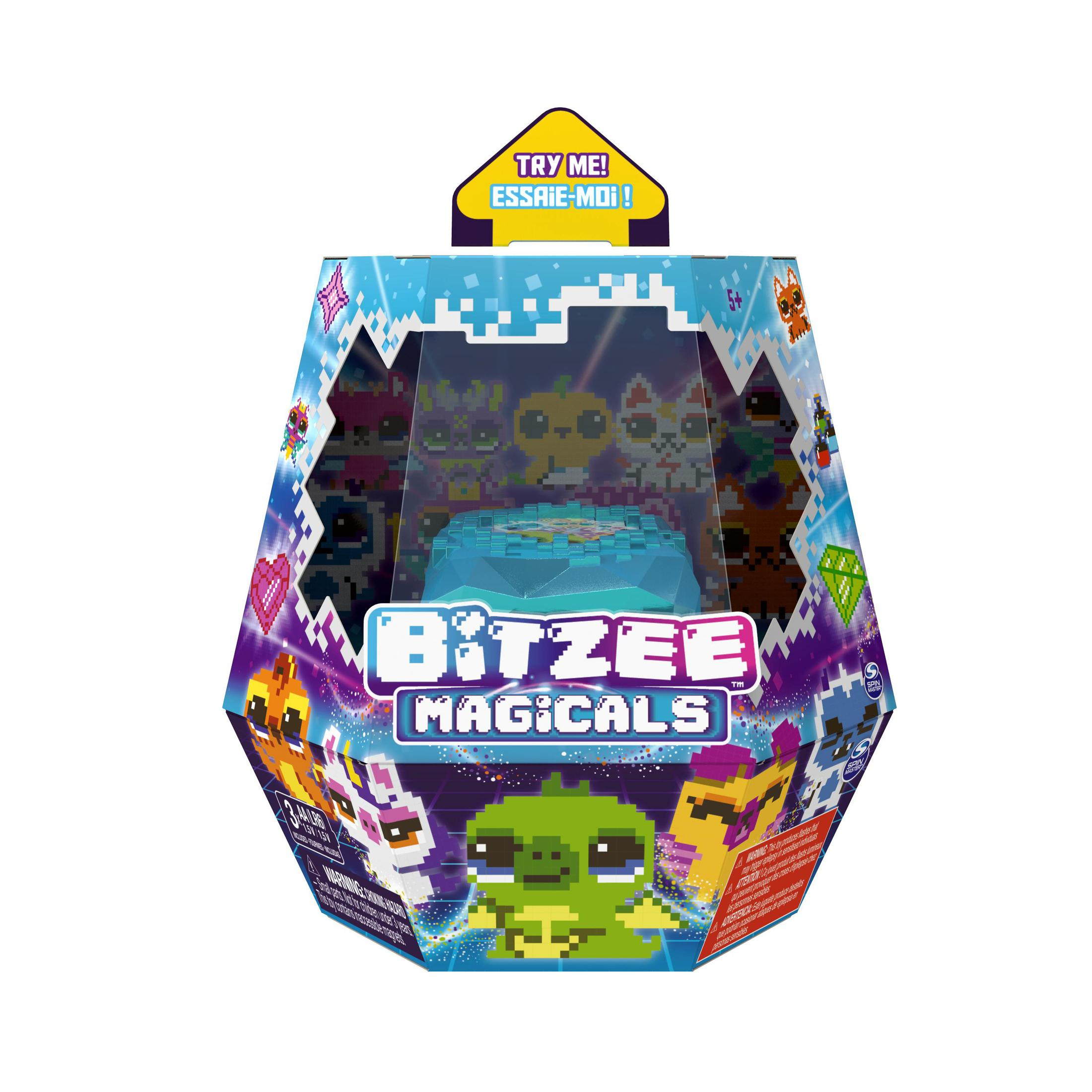 Una scatola di giocattoli Bitzee Magicals con diverse figure pixelate, su sfondo bianco.